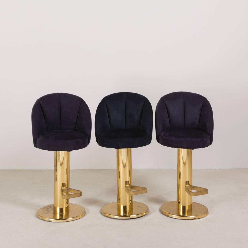 A Superb Set of Three Brass Framed Swivel Bar Stools with Black Fluted Upholstery 1980s

NB: These items are subject to a further discount over and above the trade when exported outside the EU of 20%