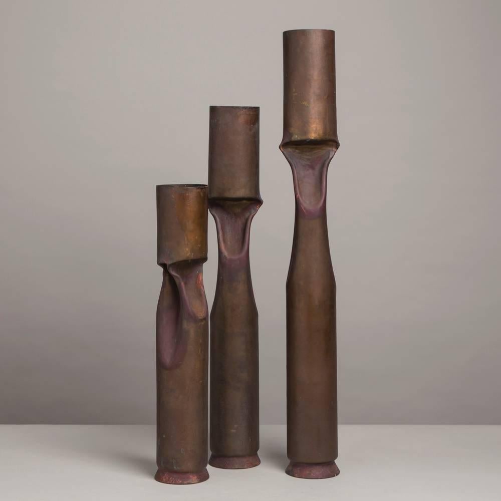 A set of three oversized Brutalist copper vases attributed to Thomas Markusen stamped copper
