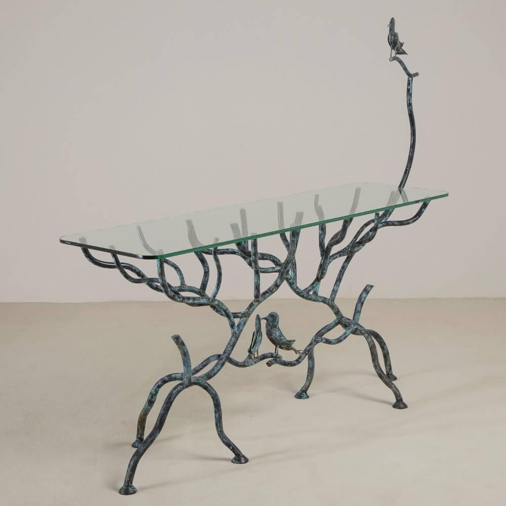 A Stunning Giacometti Inspired Simulated Tree Metal and Glass Console Table 1980s

Height to the top of the bird 144cm  

Prices include 20% VAT which is removed for items shipped outside the EU.