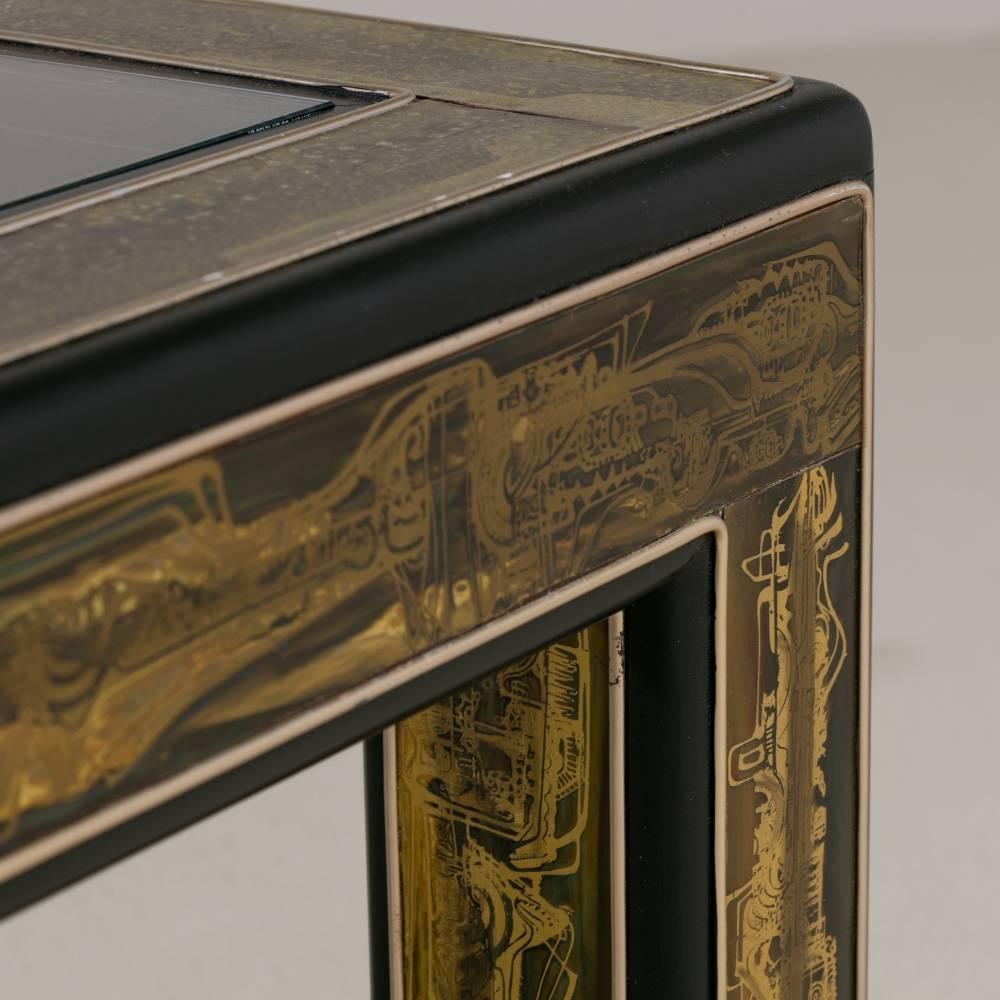 A square Bernhard Rohne designed for Mastercraft acid etched brass and ebonized coffee table with inset glass top USA, 1970s

