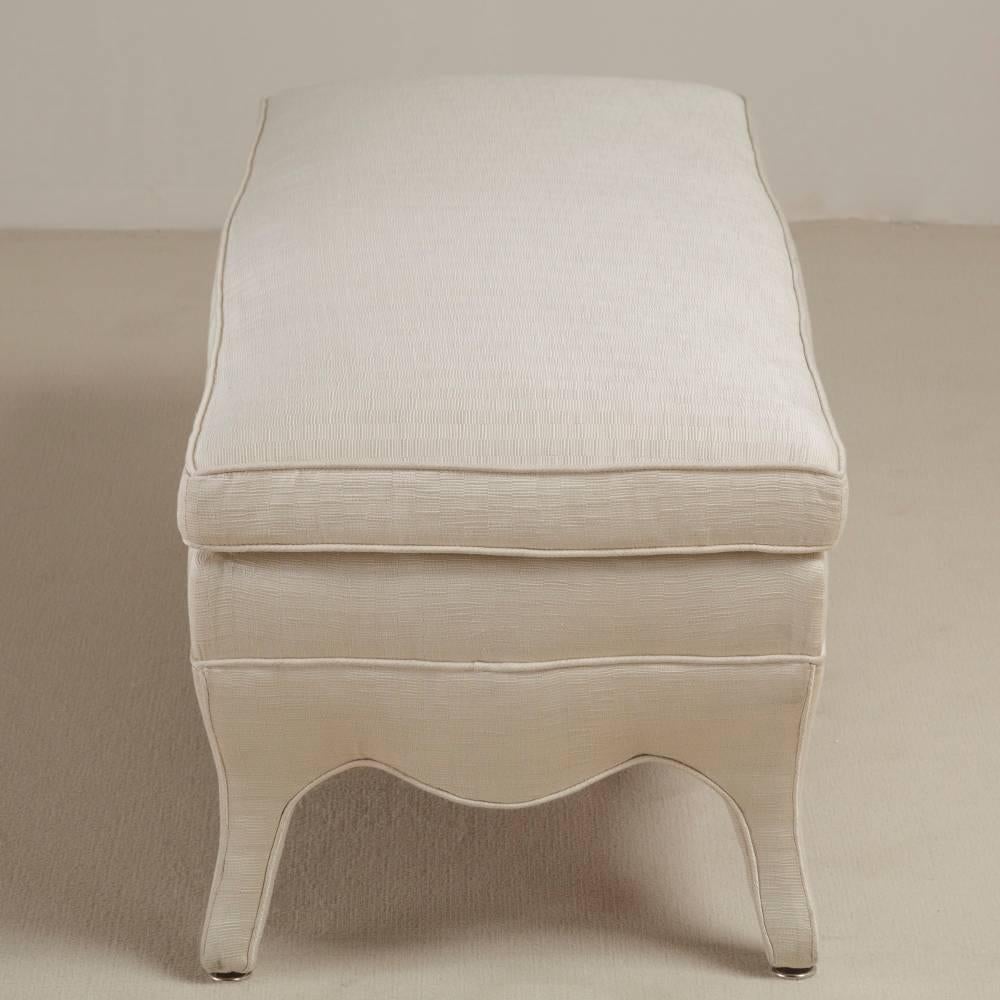 A standard French style lame upholstered long stool by Talisman Bespoke

This elegant and comfortable stool is based on the popular signature Talisman Bespoke French style sofa with a view to it being a versatile design, useful in many forms. The