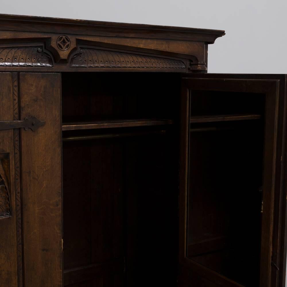 A English five-piece Arts & Crafts suite comprising of two-door cupboard, bedside table, dressing table and stool and two-door wardrobe, circa 1890 in superb original condition
Cupboard measures: H 106.5cm x W 81cm x D 45.5cm
Bedside table