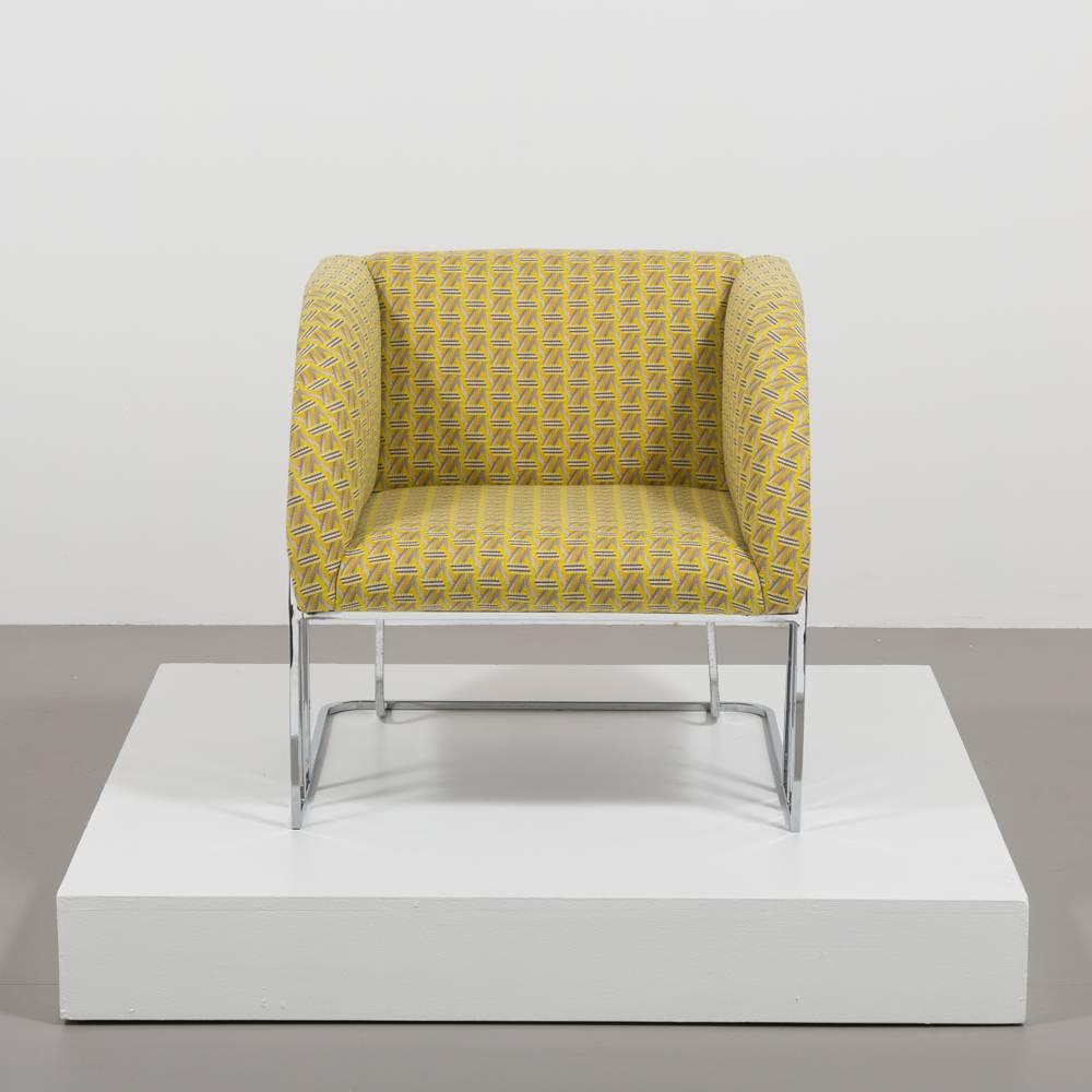 A single nickel-plated Art Deco style chair with the typically curved styling of the deco period, 1980s. 
Fully rebuilt and reupholstered in a citron patterned fabric.



