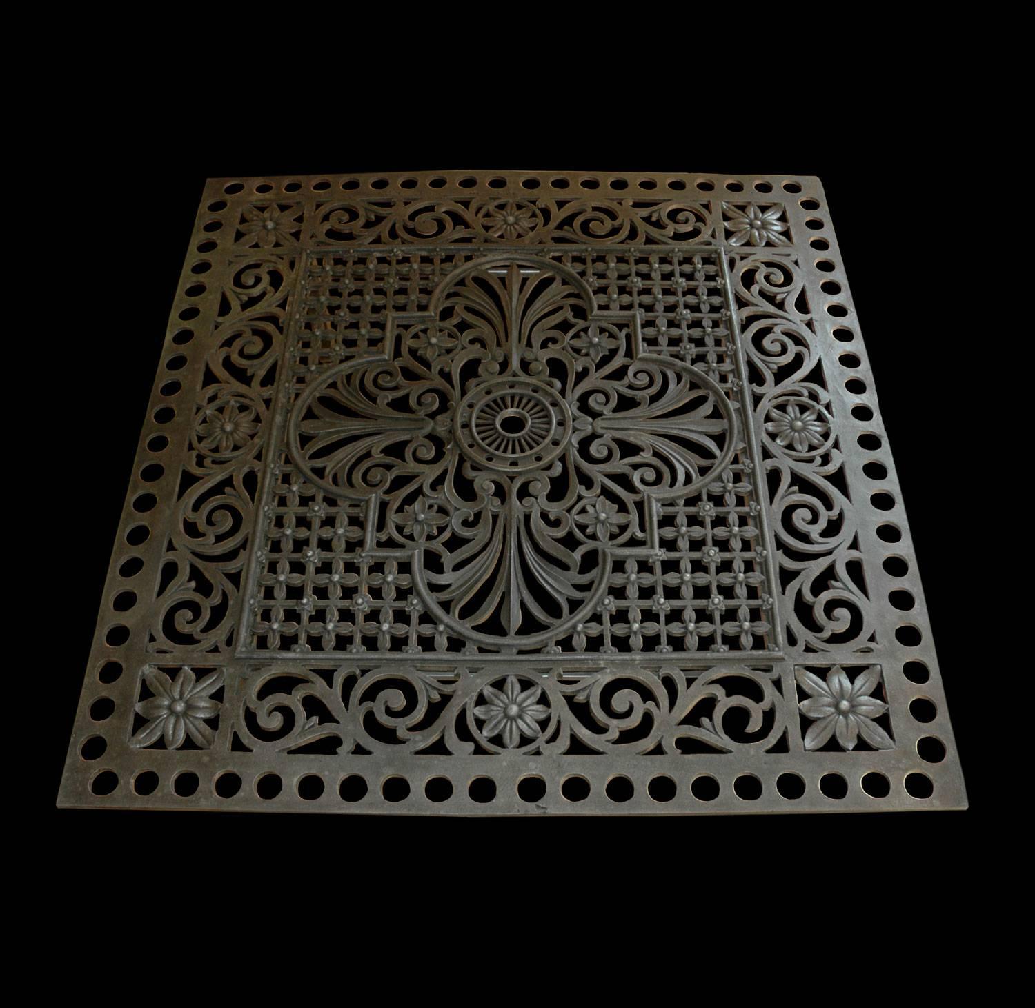Aluminum recreation of a decorative 19th Century iron grill. The original was removed from a London train station; available as a coffee table or dining table, with or without glass top.