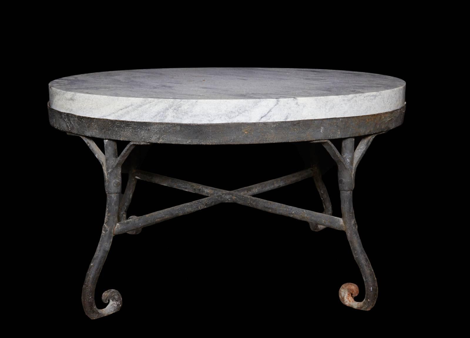 Fabulous early 19th century hand-forged iron table with a marble tabletop that is an astonishing 3 inches thick, fabricated from slabs of marble removed from the entrance of Independence Hall in Philadelphia.