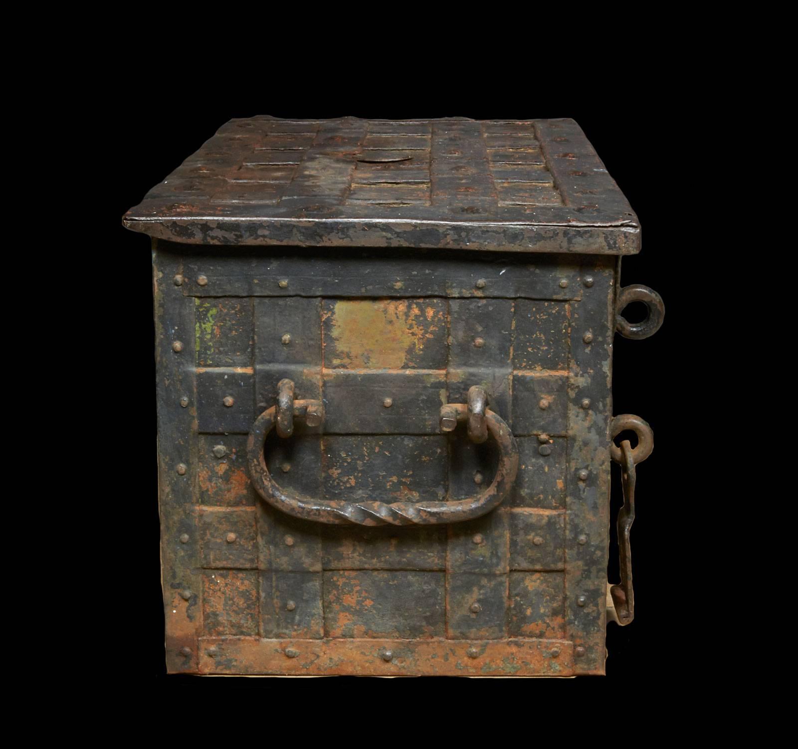 17th century iron trunk with hidden key slot and inner box with separate key. Fabulous locking mechanism.
Perfect as a unique coffee table.