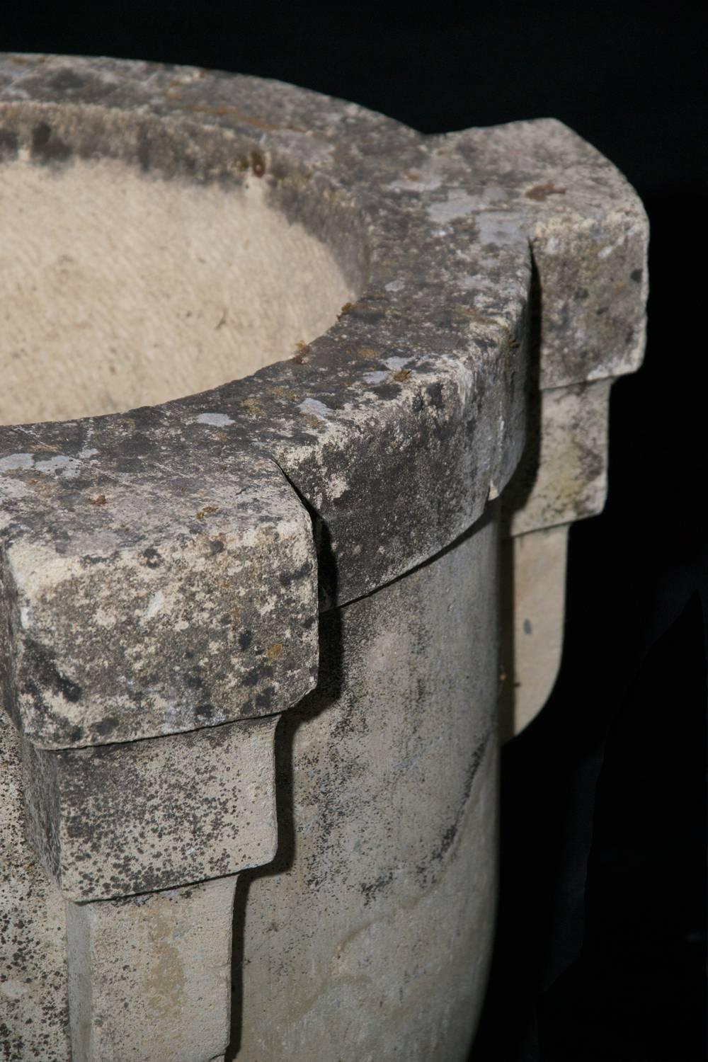 Fabulous Art Deco stone garden urns with simple, yet elegant design. Immense in size, with unique, naturally aged patina.

