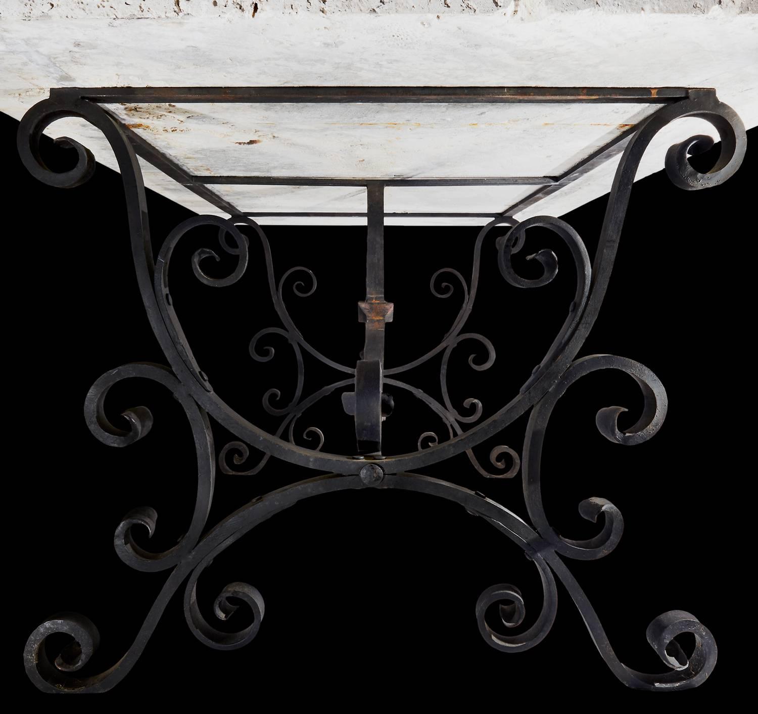 One of the most fabulous tables we've ever had the pleasure of selling. The base is hand-wrought and riveted iron circa 1890. The top is the most amazing piece of coral I have ever seen, and a material I have never seen used as a tabletop.
Due to