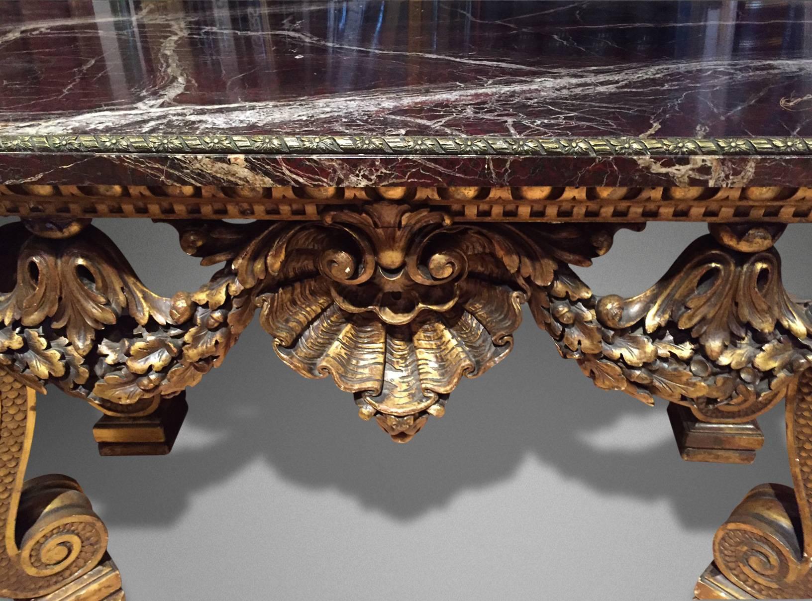 In the manor of William Kent

With a fine marble top with gilt bronze mounts, circa mid-19th century.

