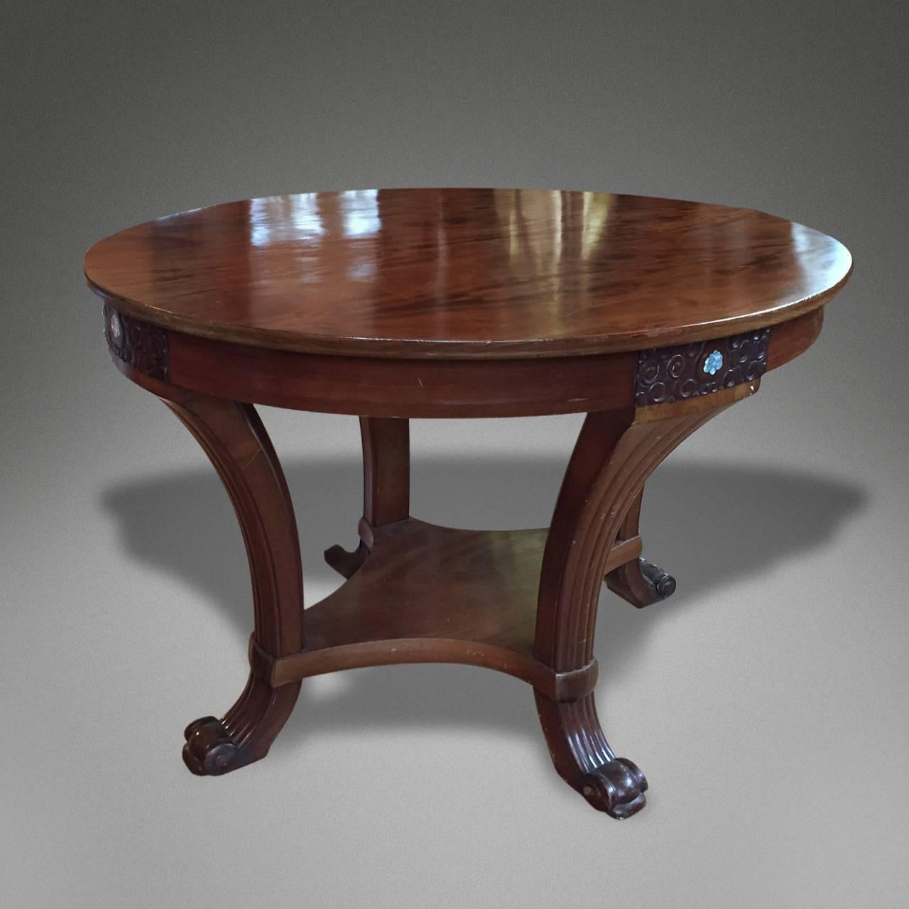 Art Nouveau walnut occasional table, with decorative carving and mother-of-pearl inlaid motifs