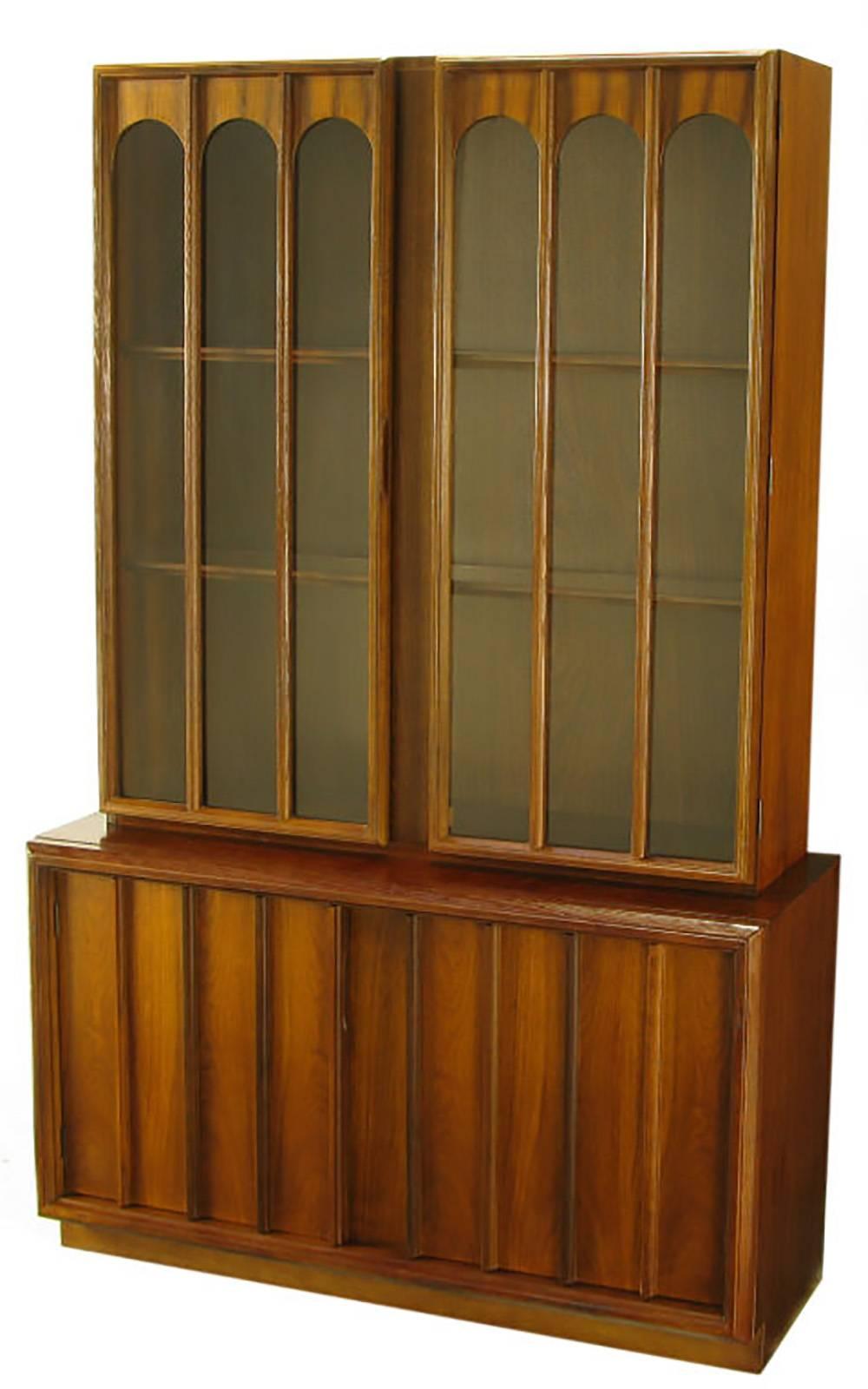 Before financial strife forced its merger into Keller Williams Furniture, Keller Furniture was the dream of a Tulsa, OK designer. An example of Keller's early work is this tall cabinet, with glass and walnut wood colonnade doors for the illuminated