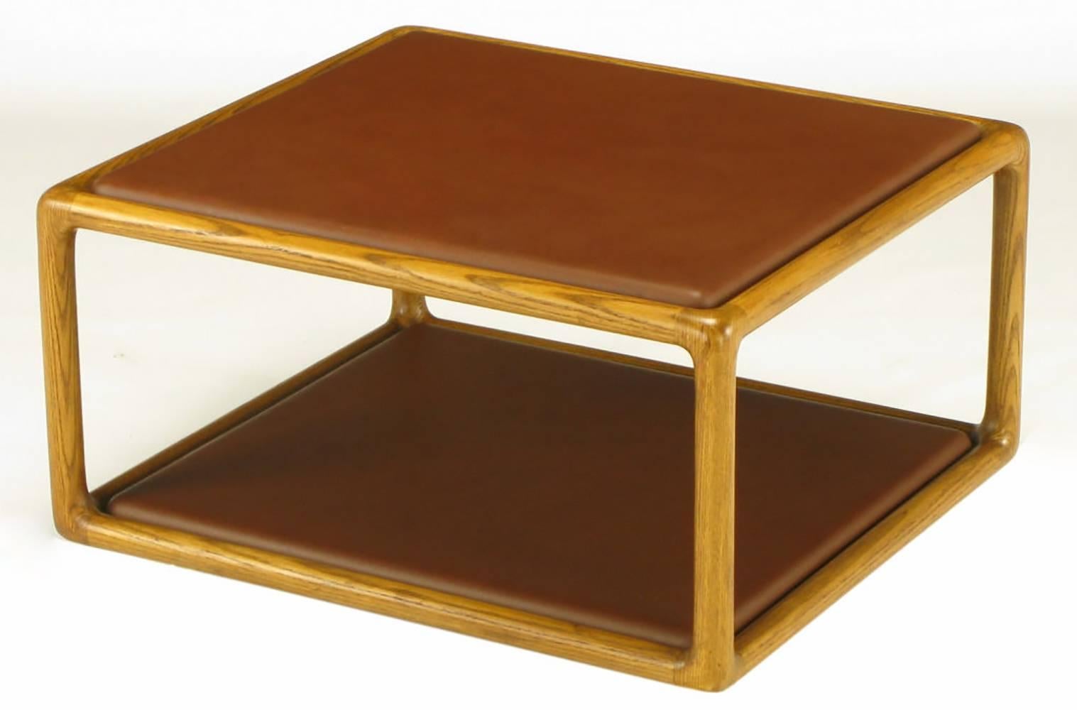 Ward Bennett for Brickel Associates Inc., honey ashwood and russet-chestnut brown tanned elephant hide coffee table. Can be used as an ottoman. Radiused at all edges and corners.