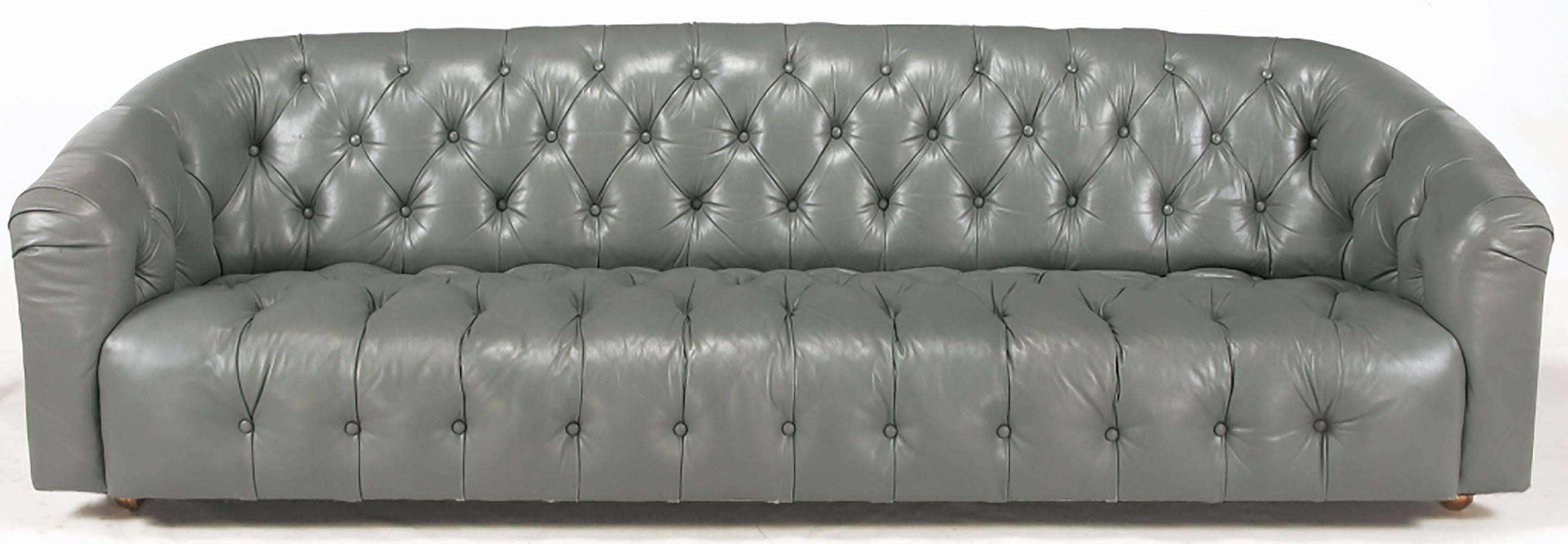 grey leather tufted sofa