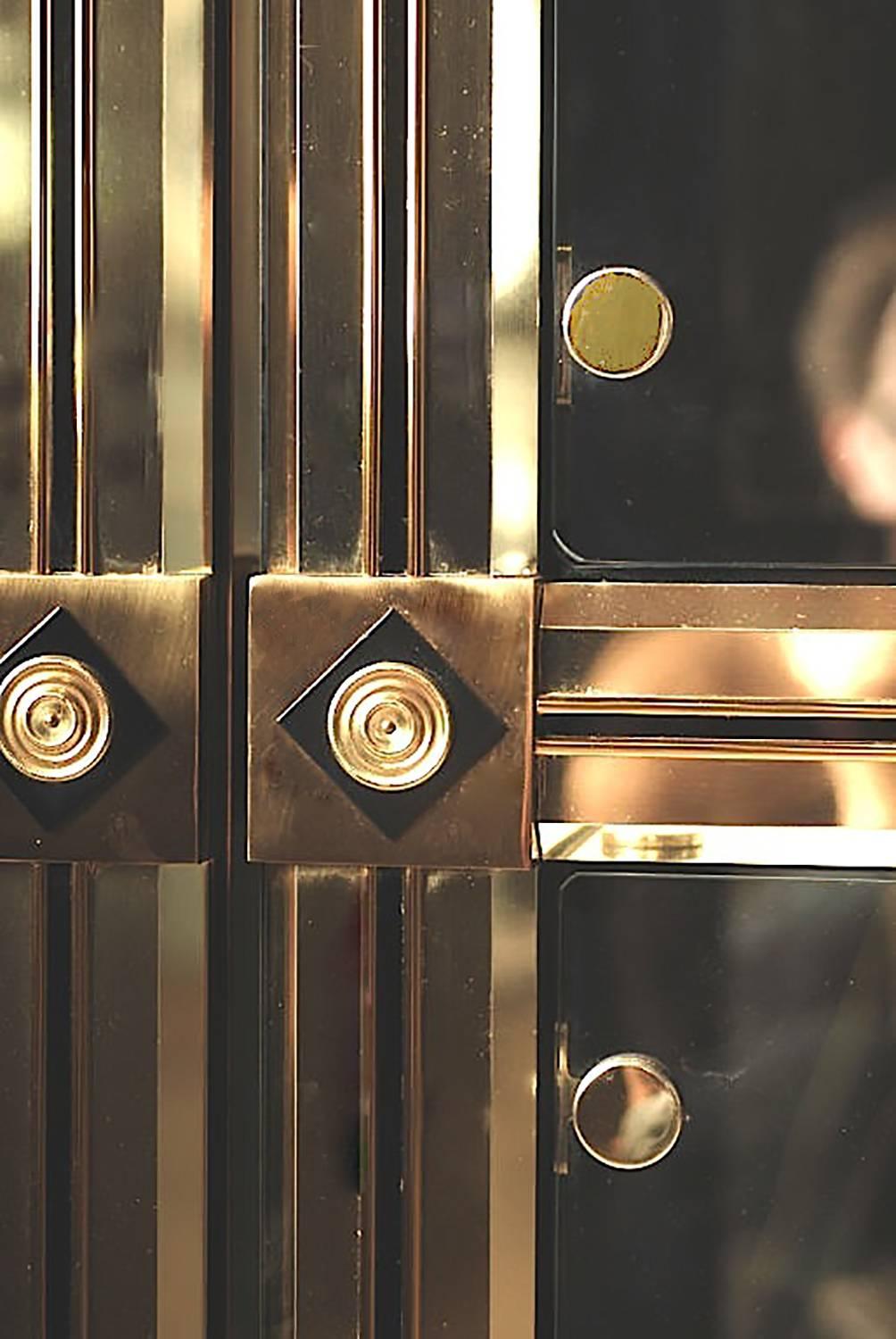 Three Mastercraft Empire Revival Brass and Black Vitrines 1