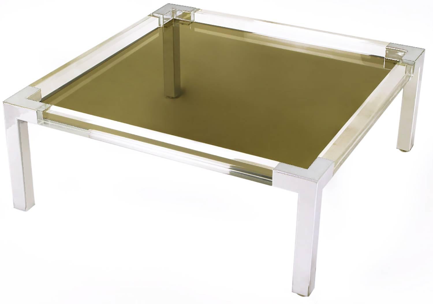 Square form coffee table with chromed metal legs and corners, Lucite side rails and recessed smoked glass top. Similar to designs by Karl Springer and Charles Hollis Jones.