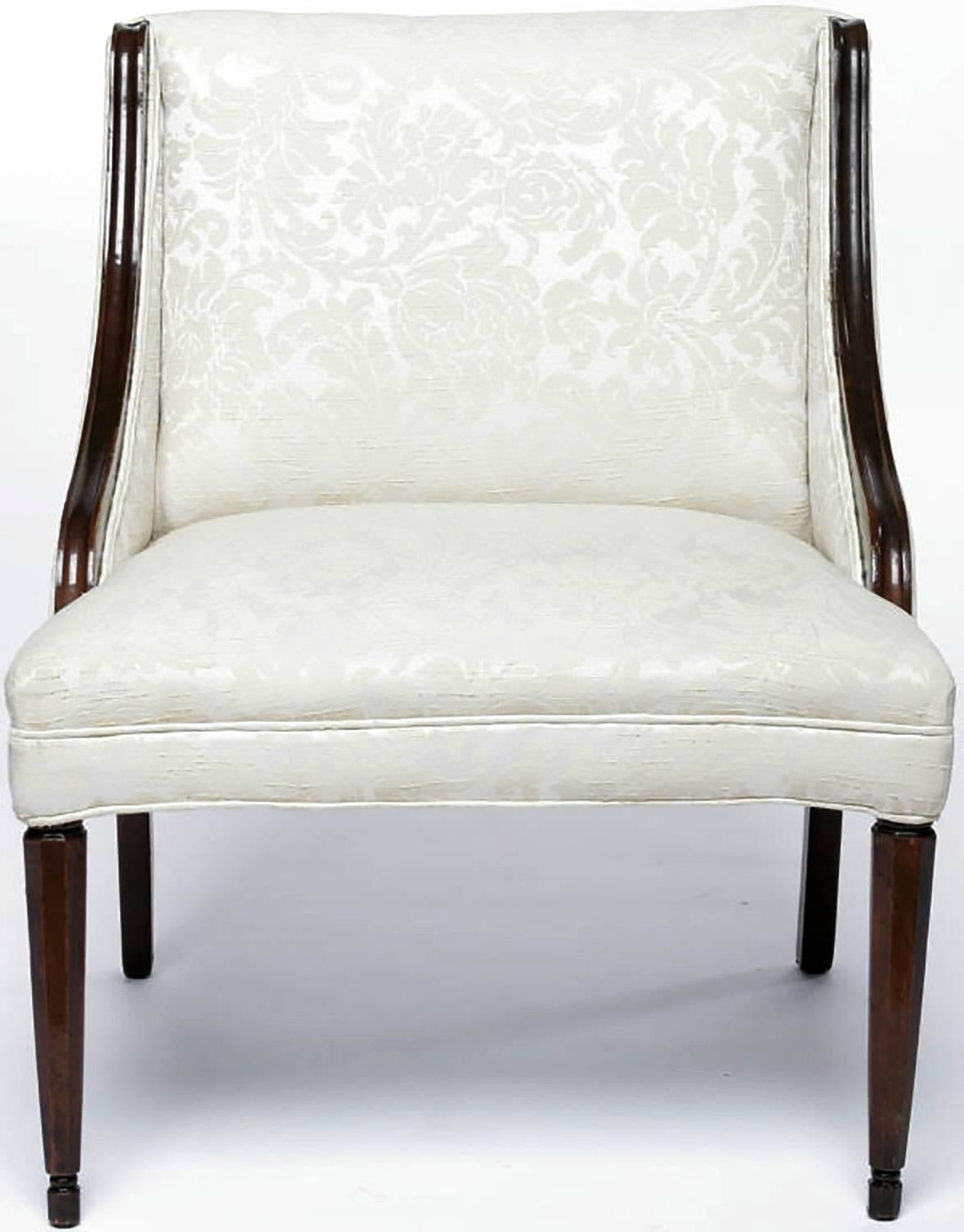 Wonderful side chairs with gondola arms and dark mahogany wood frames. Upholstered in vintage ivory damask fabric.