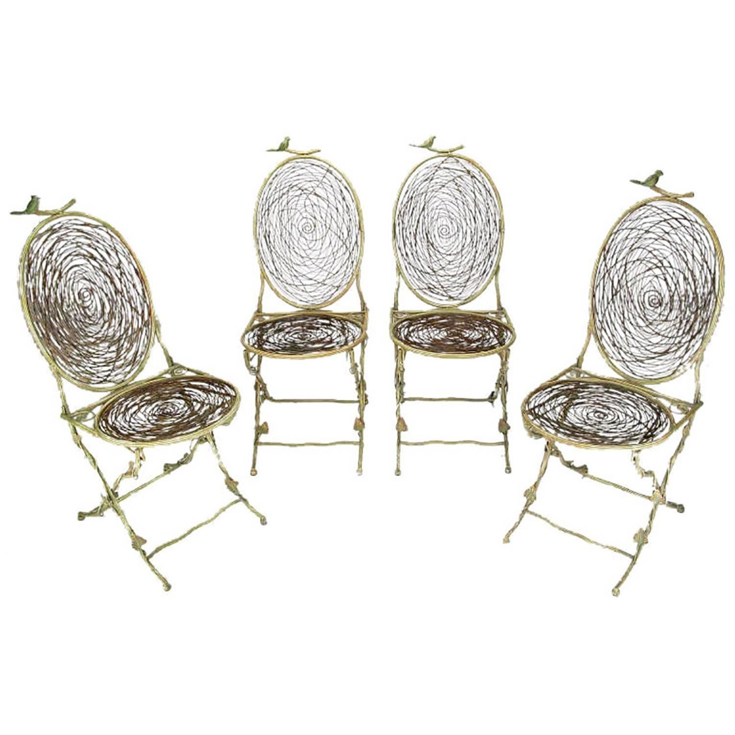 Four Iron Faux Bois Folding Chairs with Bird Nest Seats and Backs