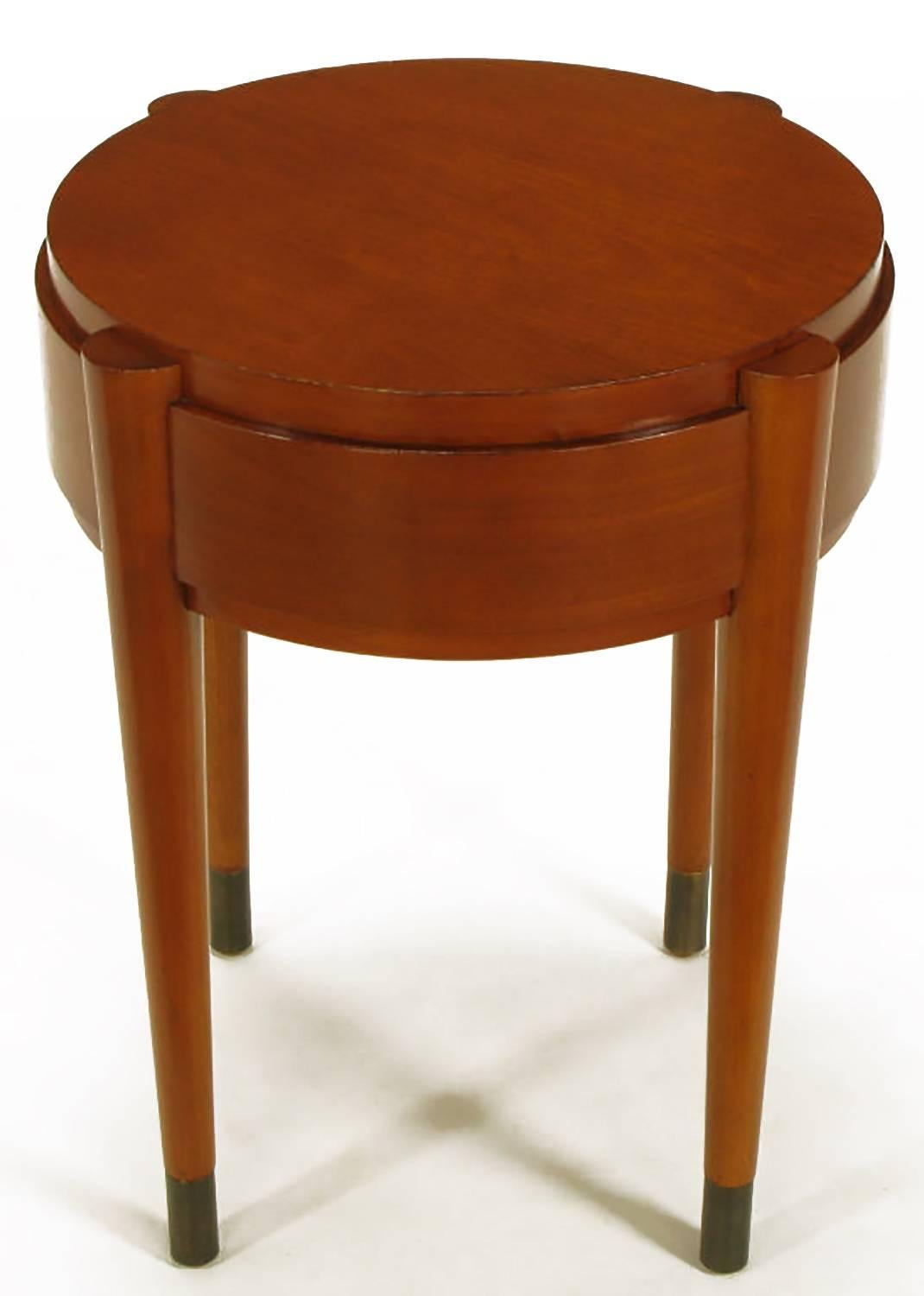 Pair of bentwood birch side tables stained red with tapered legs and dark brass sabots. Recessed top with half exposed legs.