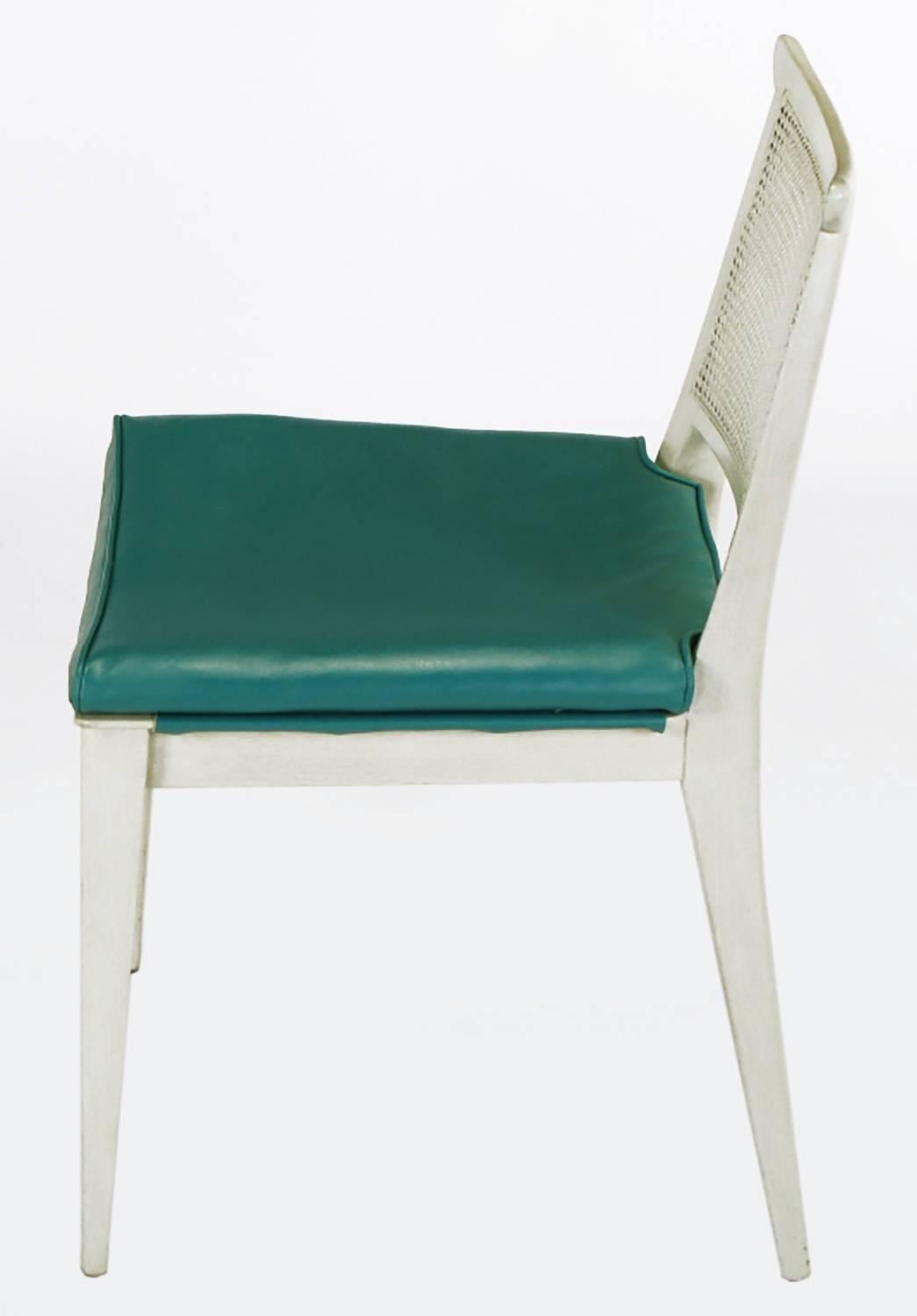 Bleched and off-white glazed mahogany side chair #4632, with turquoise vinyl covered seat and caned back by Edward Wormley for Dunbar. Excellent side or occasional chair or desk chair, slight Asian styling with yoke topped back. Unexpected front and