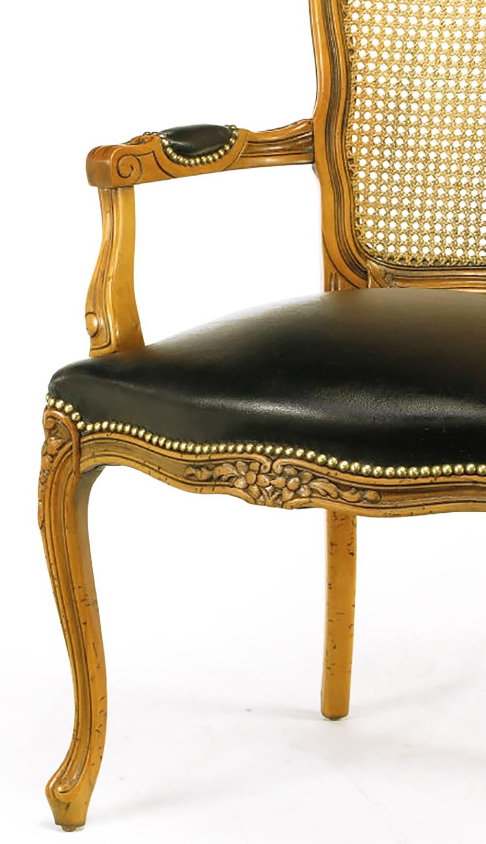 Cane Four Italian Carved Wood and Black Leather Armchairs
