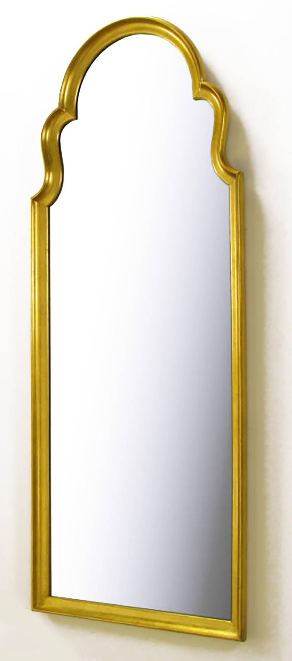 With Moorish styling and aged gilt finish, this wall mirror would greatly complement a console table, or work as a beautiful powder room mirror. 62