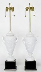Pair of White Porcelain Urn Table Lamps with Male and Female Busts in Relief