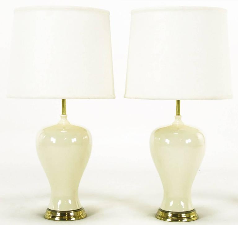 Pair of Ivory Glazed Curvaceous Vase Form Ceramic Table Lamps For Sale