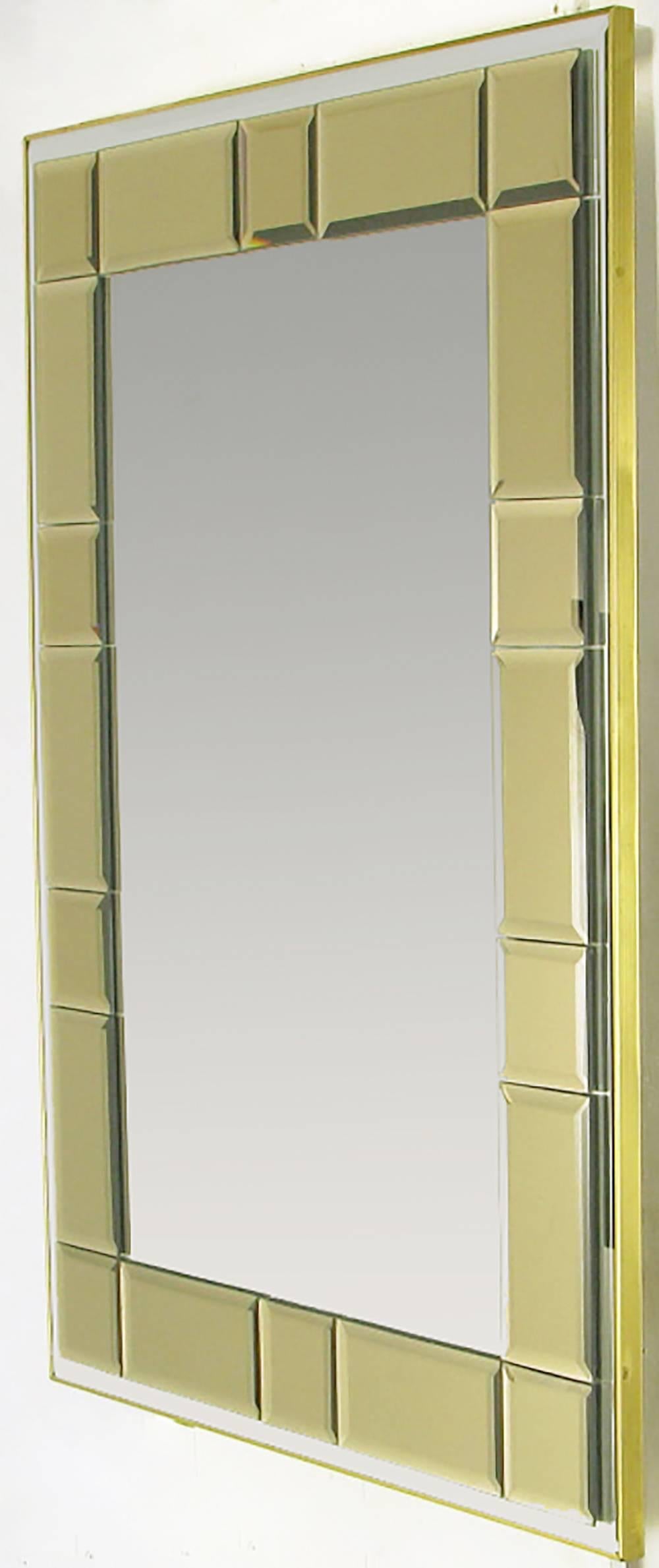 Striking and distinctive, this Labarge mirror is clad in a simple brass anodized aluminum frame, with the beveled mirror surrounded by a beveled and smoked mirrored mosaic border. It can be hung vertically or horizontally.