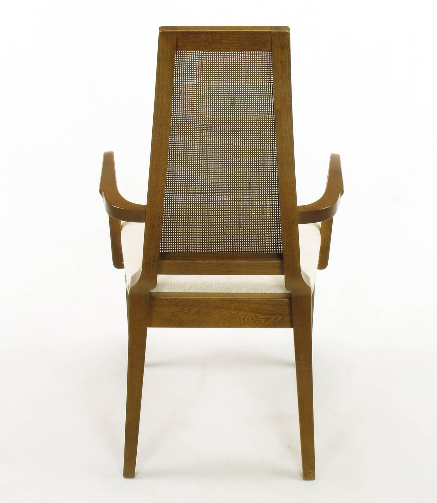 Sleek, circa 1950s Modern Walnut and Cane Dining Chairs For Sale 3