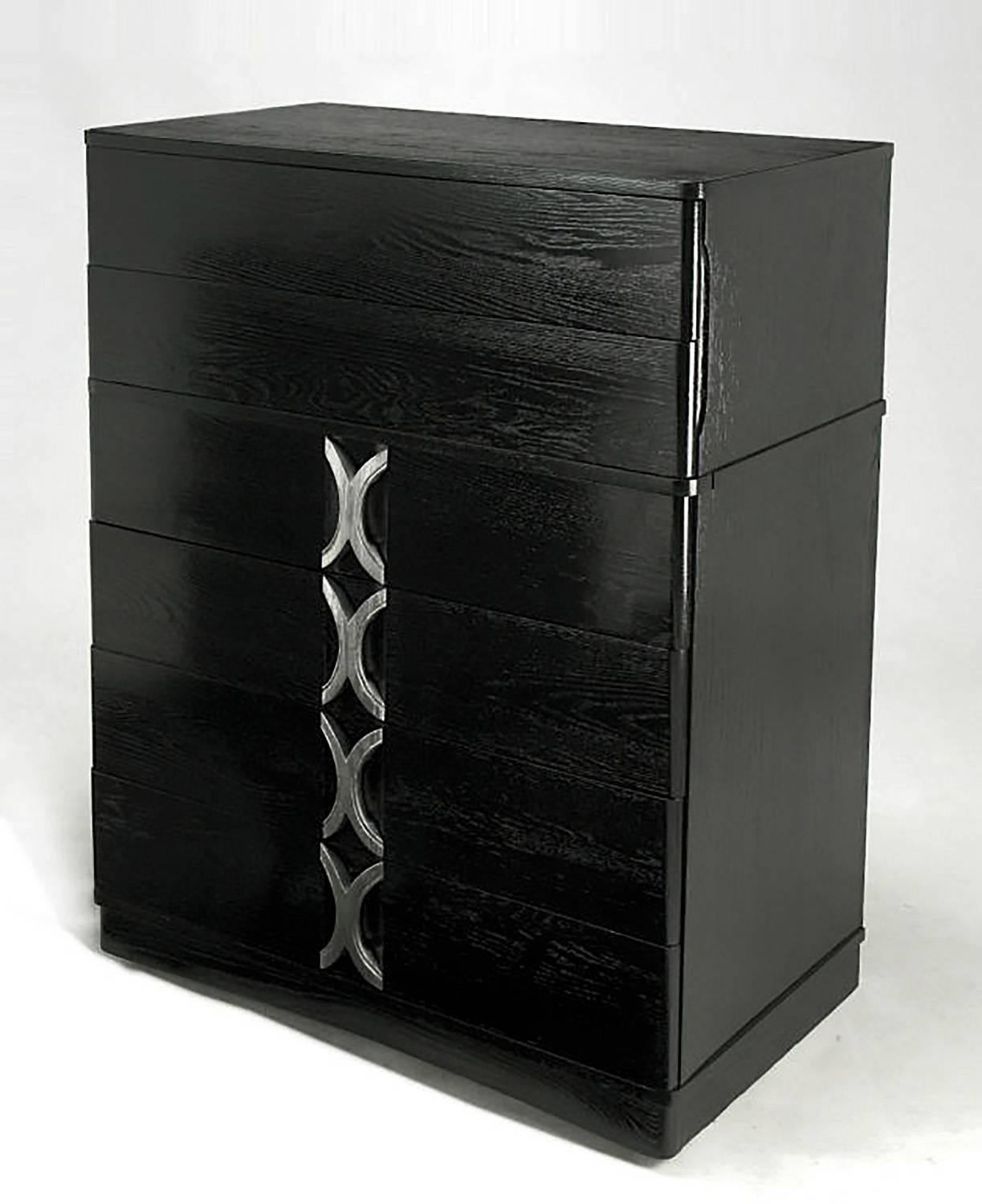 With a fresh update of an elegant form, this six drawer tall commode has newly applied black lacquer over a deep grained oak, with a clear French polish finish. The carved wood X pulls are silver leafed to create a striking combination. Retains the