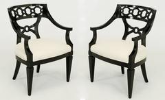 Paar Sessel aus schwarzem Lack und Wolle mit ineinandergreifenden Ringen