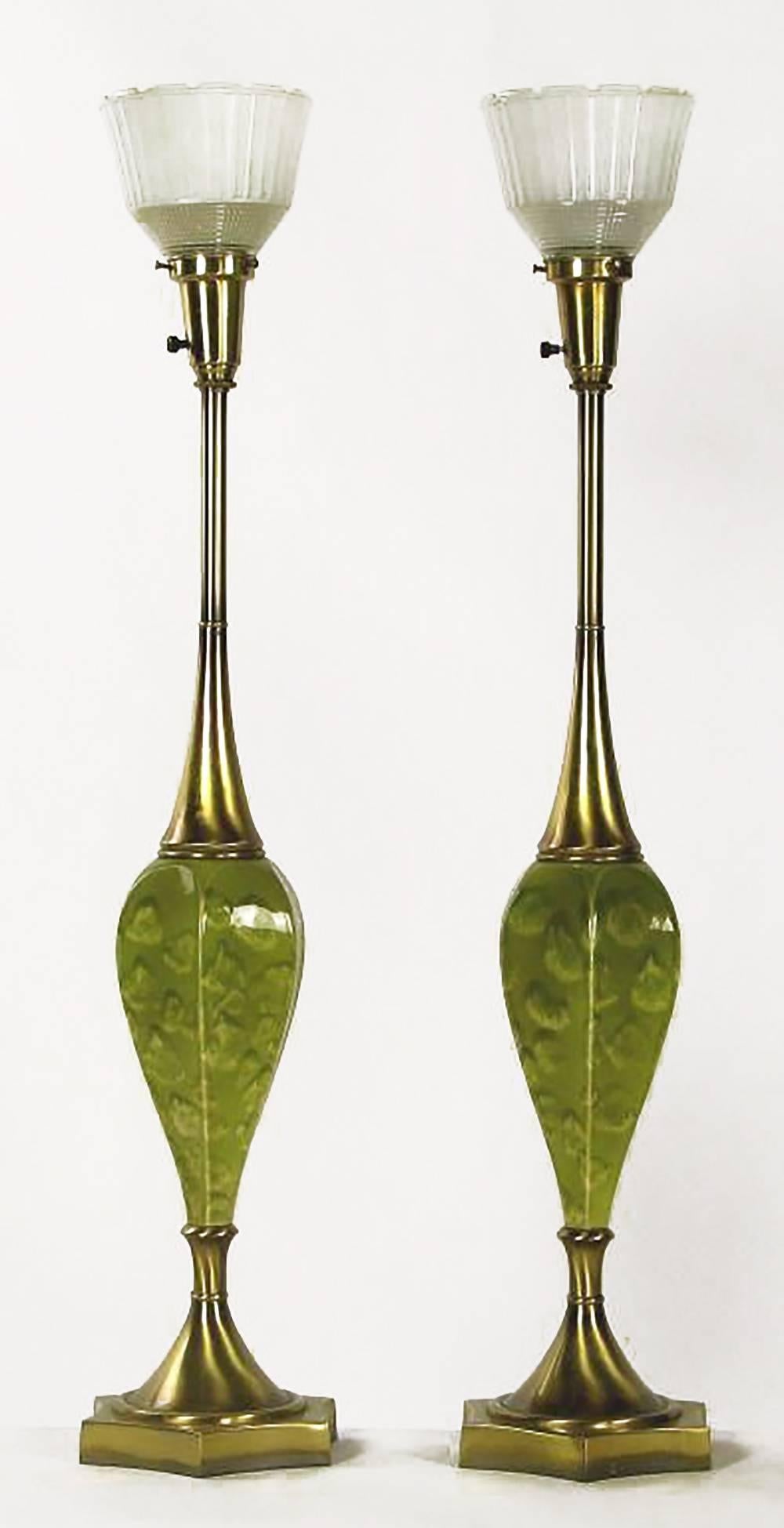 Colorful green lamps, with a green oyster pattern glaze over inverted bulblike ceramic bodies. Base and top are antiqued brass, with the trademark Rembrandt Holophane style glass diffusers. Sold sans shades.