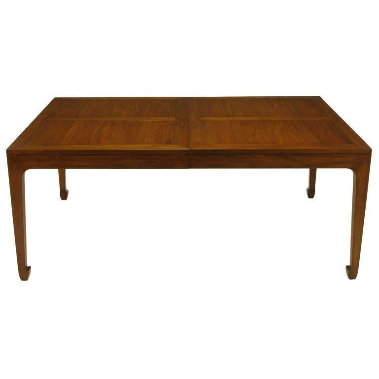 Figured walnut parquetry top dining table, possibly designed by Michael Taylor for Baker's Far East collection. Four figured walnut panels with offset grained borders. Incised apron and tapered Ming style legs. We also have the same table available