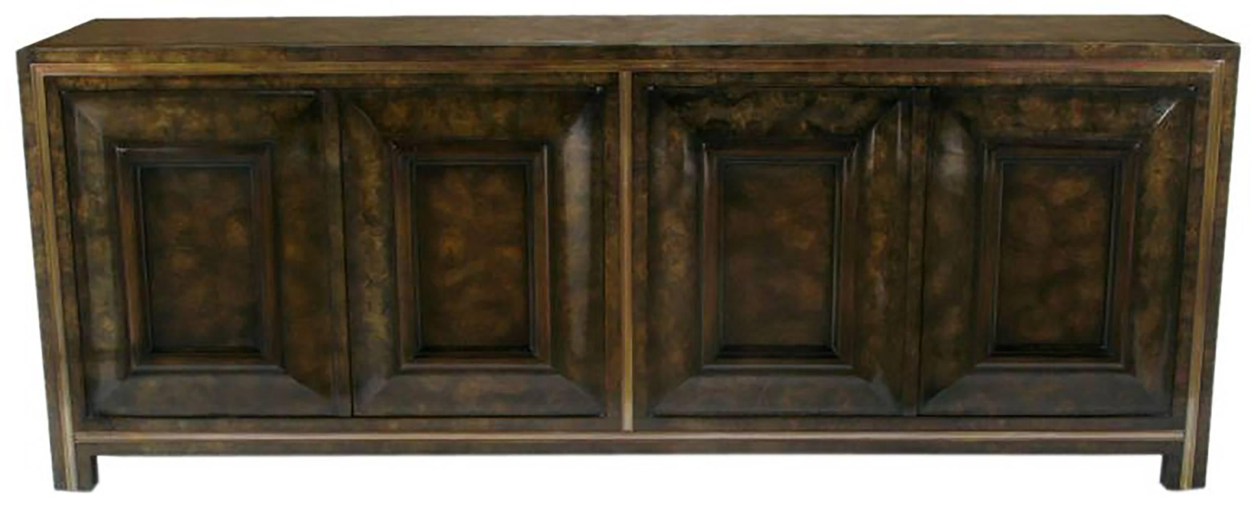 Elegant and substantial cabinet by Mastercraft. The four frame and panel doors open to reveal a two section storage area. One side has four drawers with a silverware drawer. The other section has shelves. Brass inlay has a unique acid washed patina