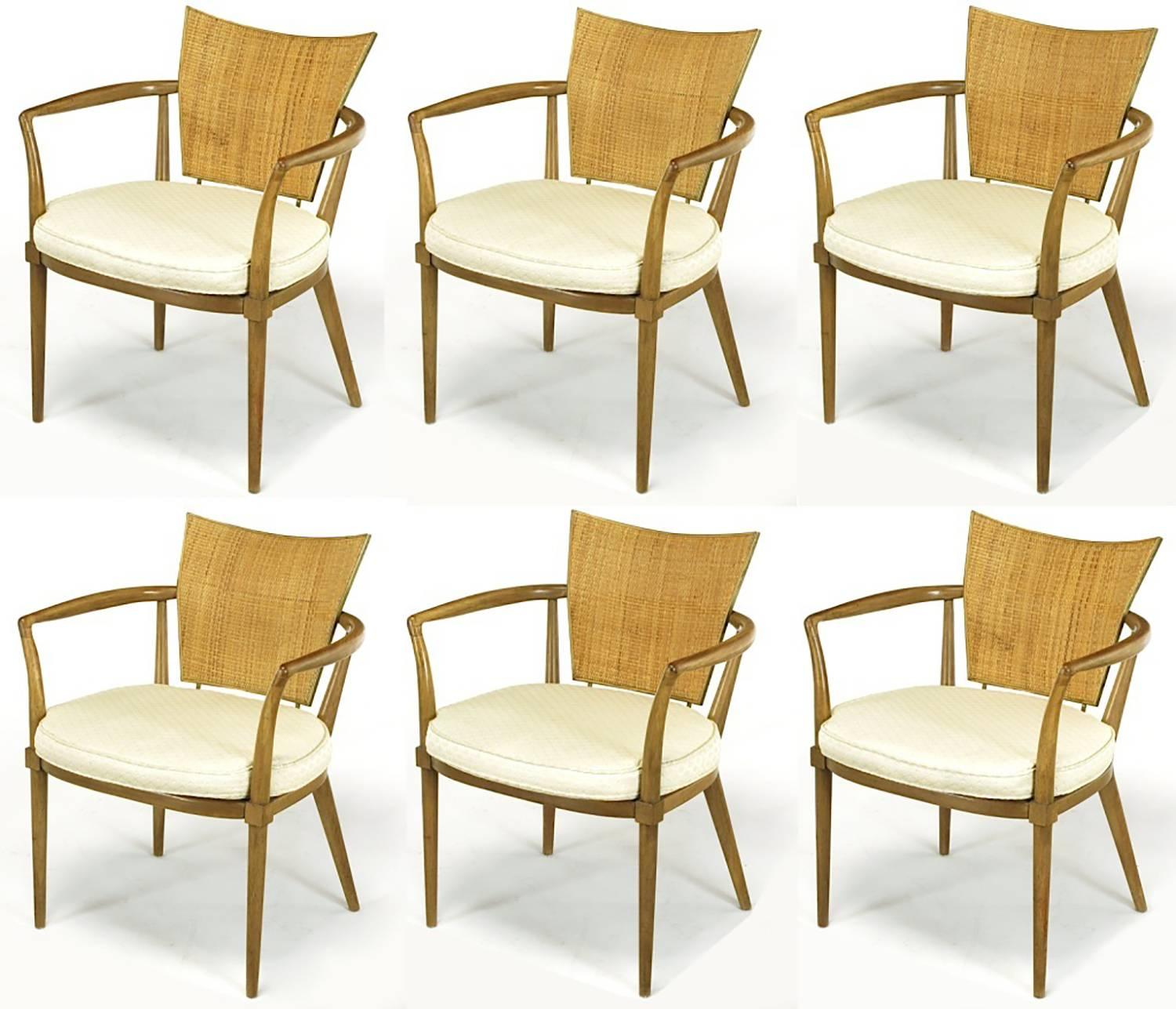 Set of six mahogany, brass and cane dining armchairs from Bert England's 