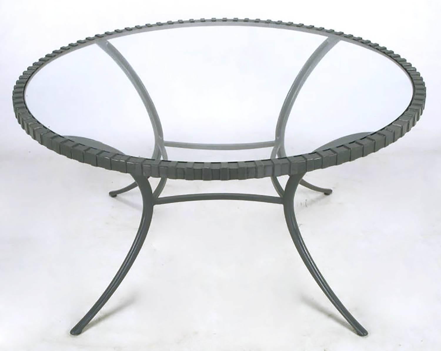 Thinline cast aluminum, glass top dining table in fresh slate gray enamel. One of the first manufacturers of cast aluminum furniture, Thinline used only the best castings and alloys. As a result the Fine edging and crisp lines have stood the test of