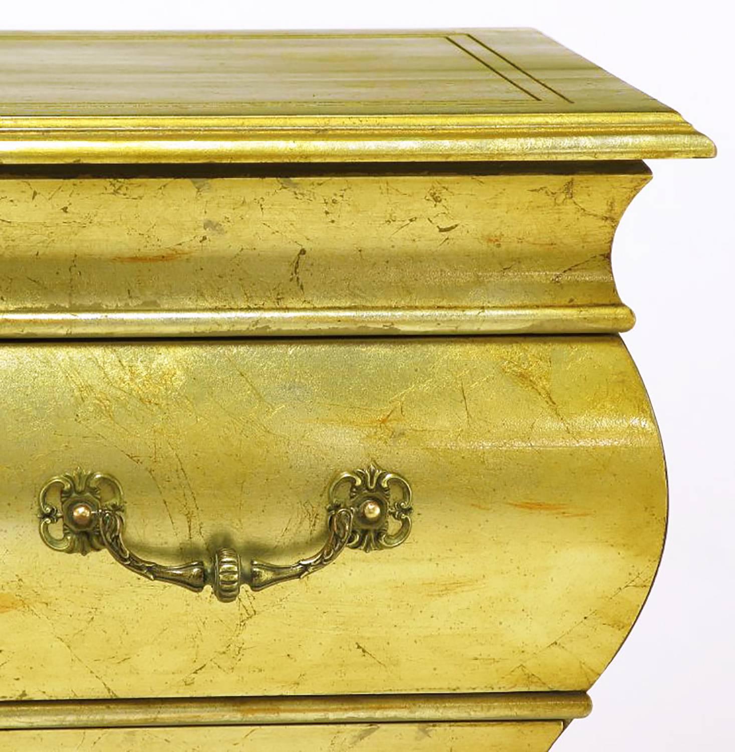 Mid-20th Century Pair of Henredon Gold Toned Silver Leaf Bombe Two-Drawer Commodes For Sale