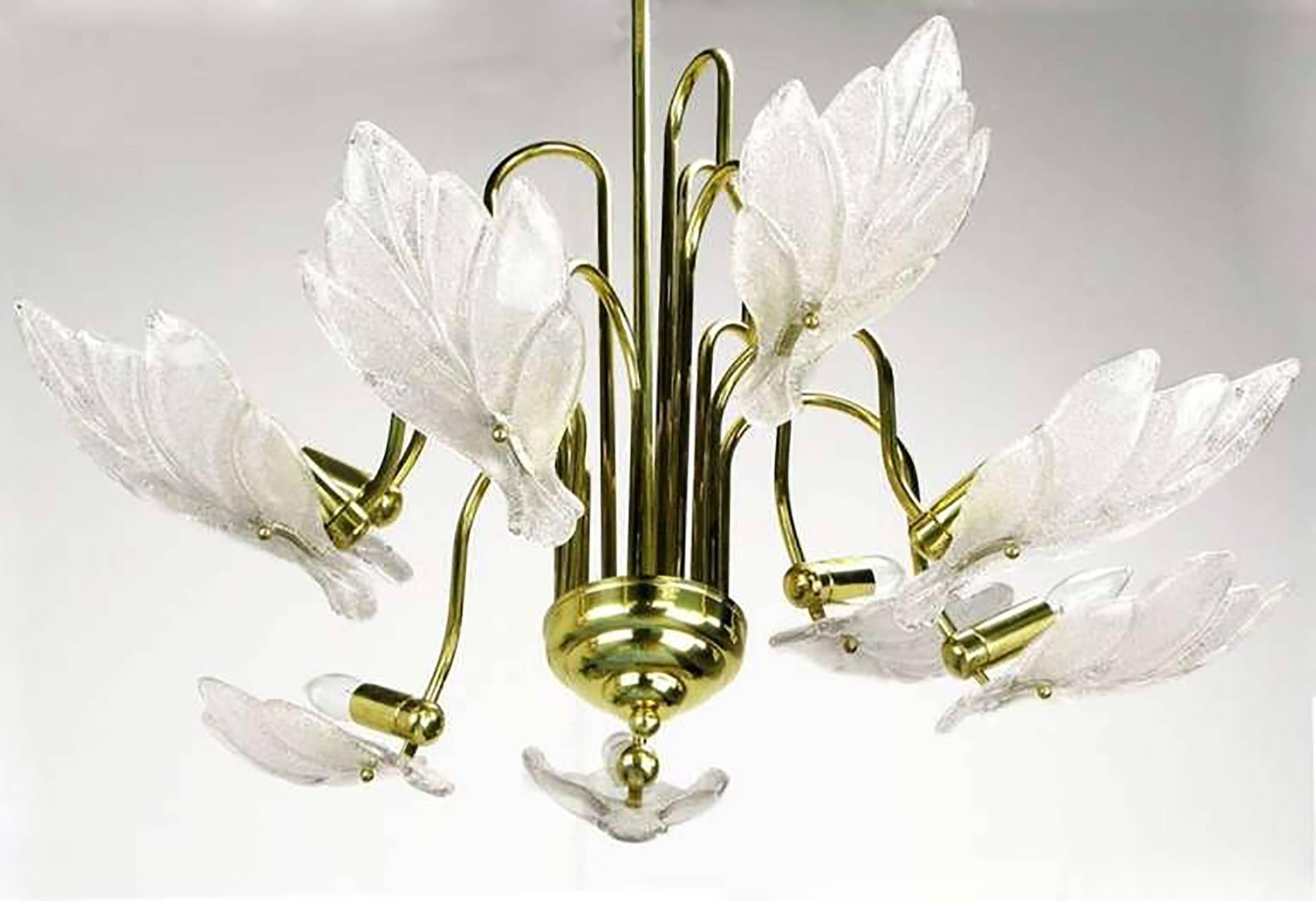 Elegant nine-arm Murano glass leaf shade chandelier in the style of Barovier & Toso. Each leaf is opaque bubble glass with gold leaf inclusions. 360 possible watts of illumination. Matching sconces available. Believed to be of Italian origin.