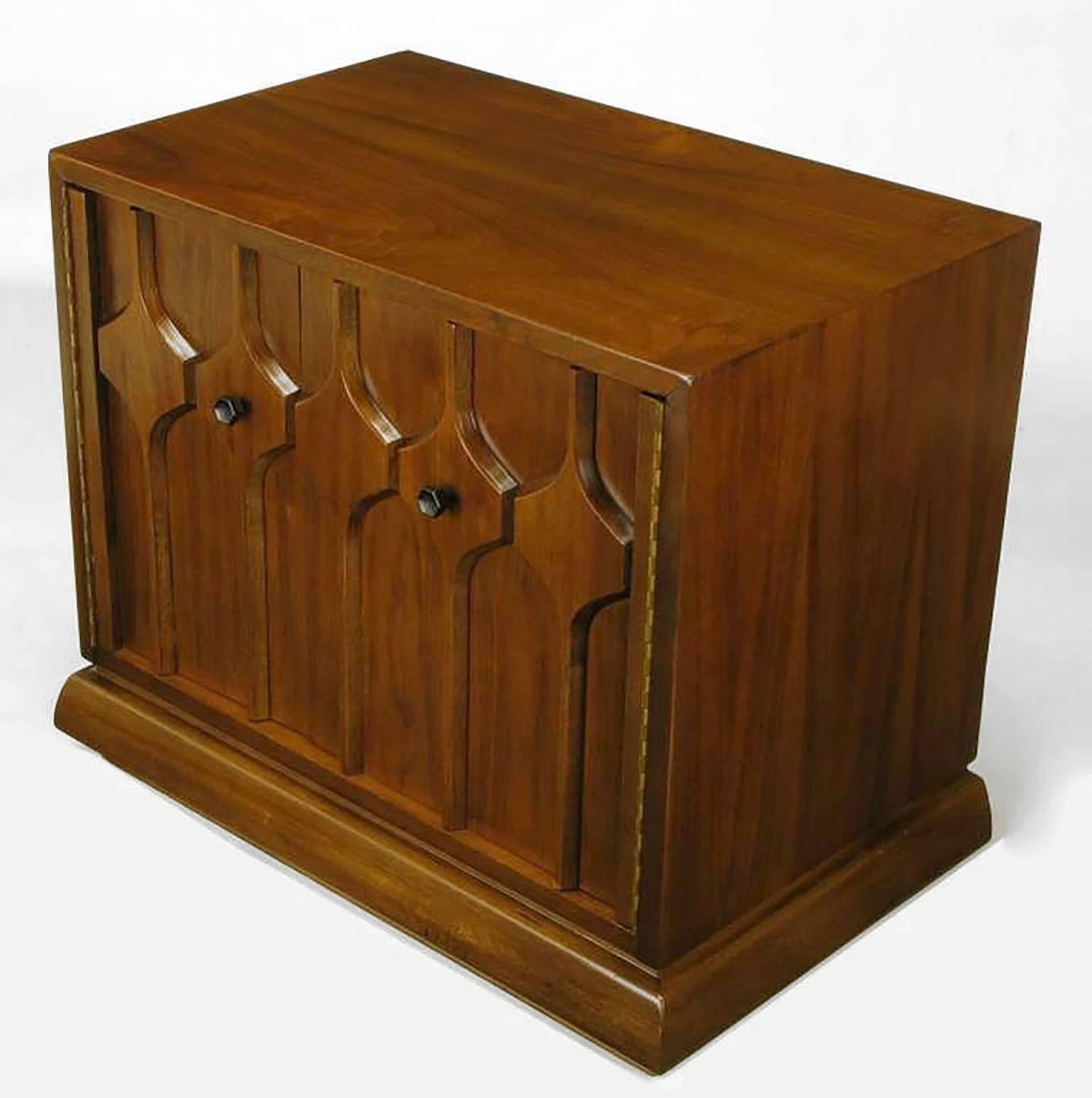 American Pair of Walnut Nightstands with Carved Relief Doors