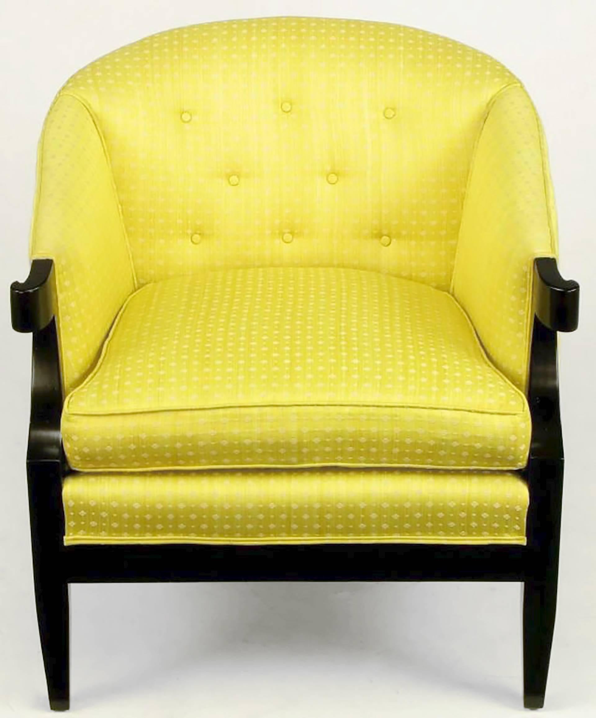 Designed by Winsor White and William Millington for Baker's 1954 Continental collection, these armchairs are upholstered in a vintage yellow embroidered silk fabric, with refinished ebonized walnut frames with turned arms and tapered front and back