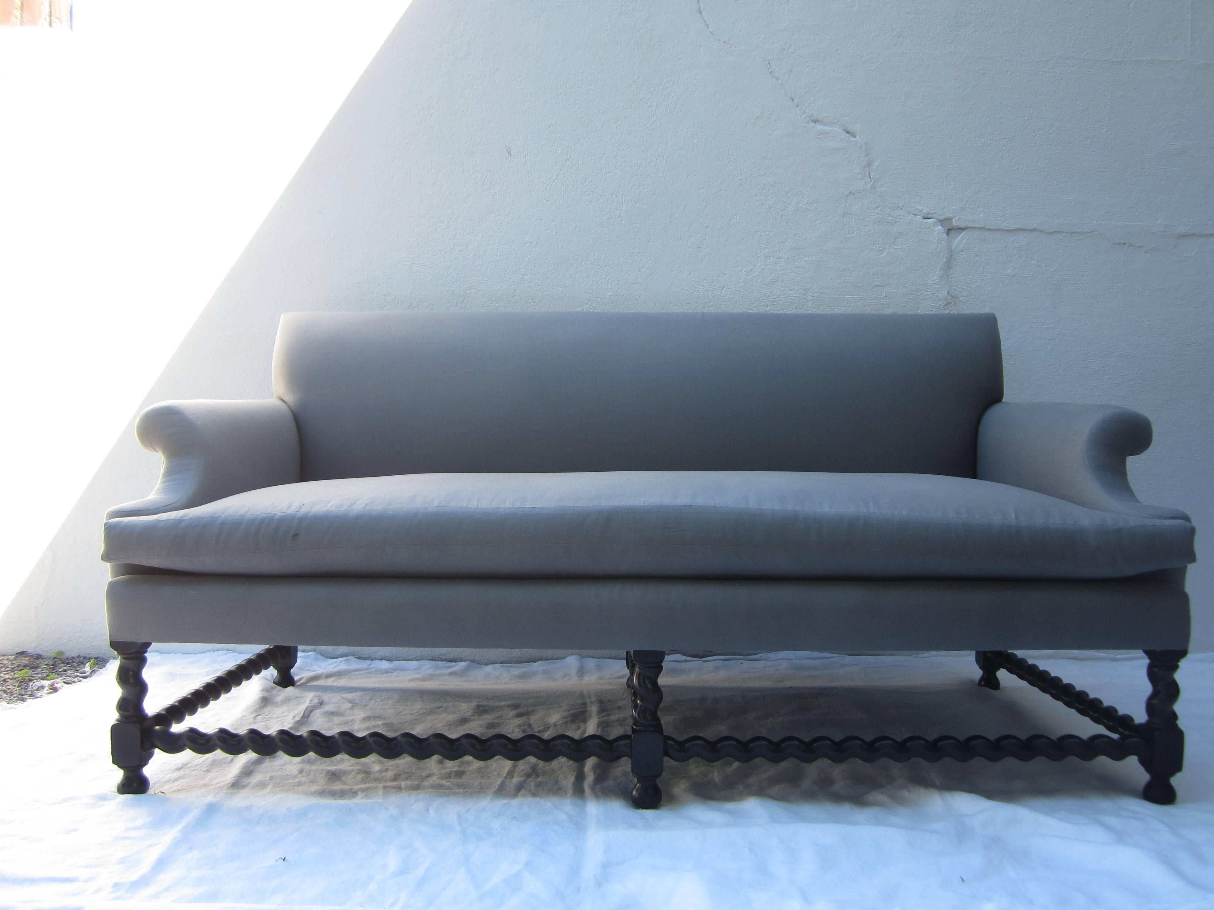 Newly refurbished twisted barley base settee with single cushion, upholstered in a fine gray linen.