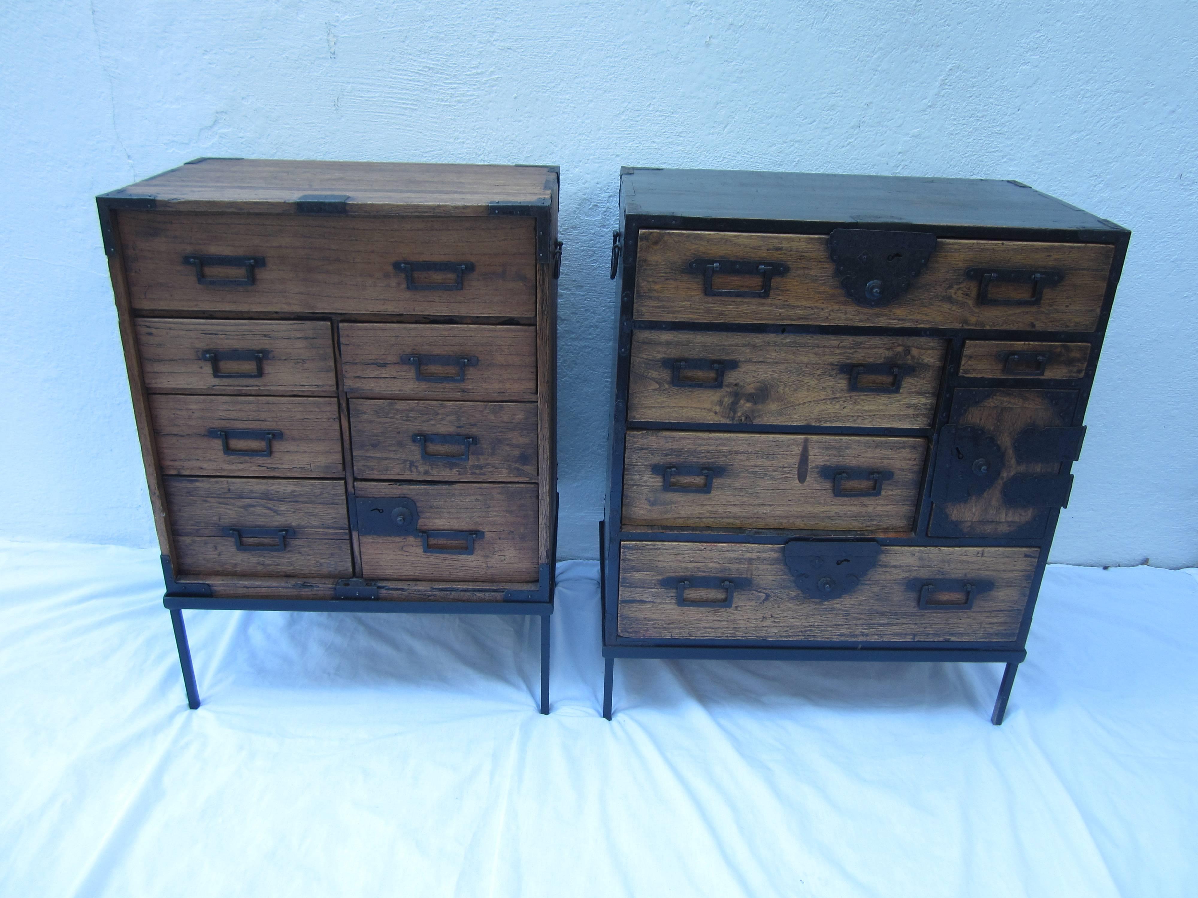 A complementary pair of Japanese elmwood Tansus on custom modern iron stands.

The chest on the left.... unfinished elmwood.

It measures: 20