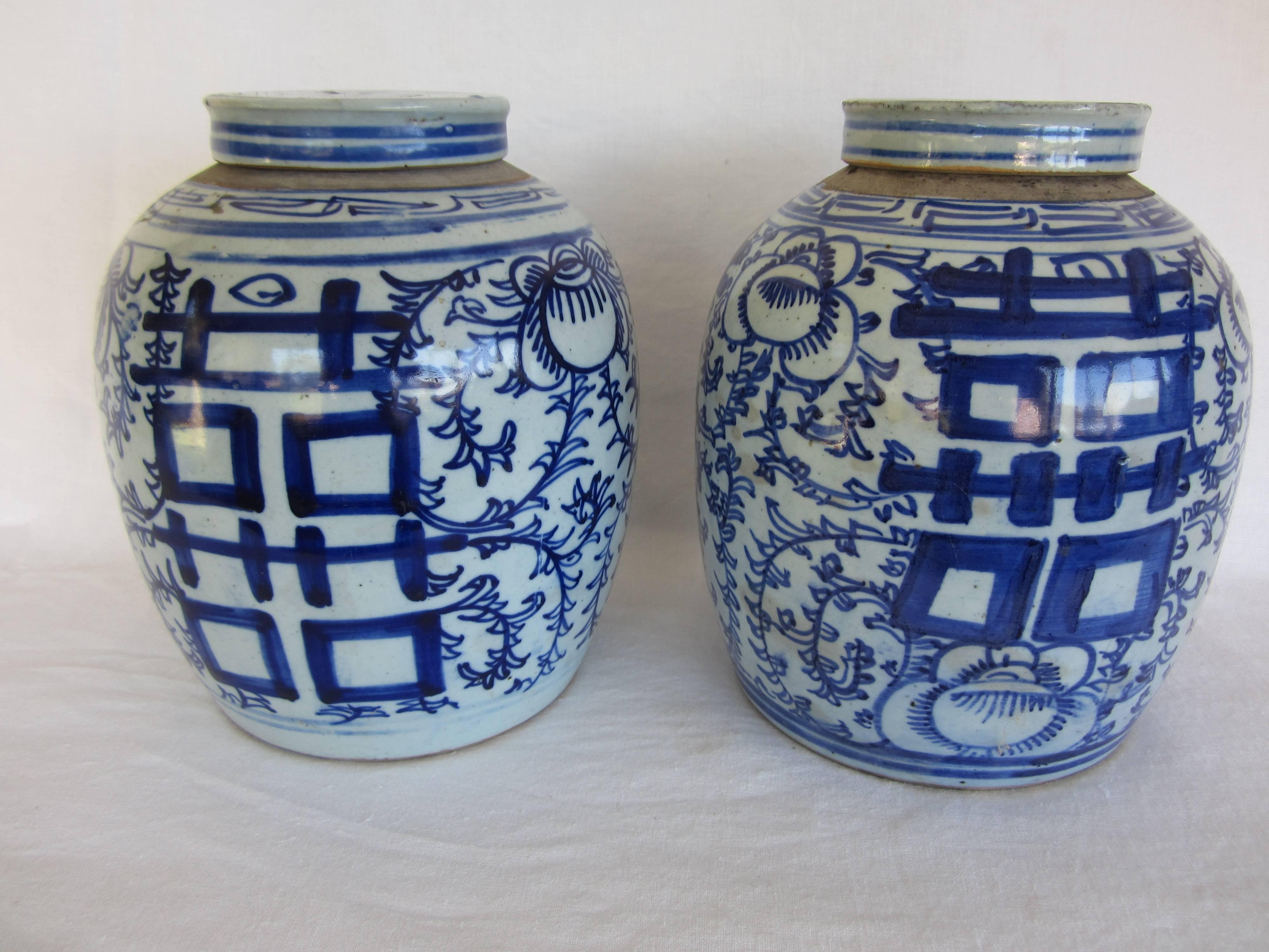Pair of Chinese blue and white lidded jars.