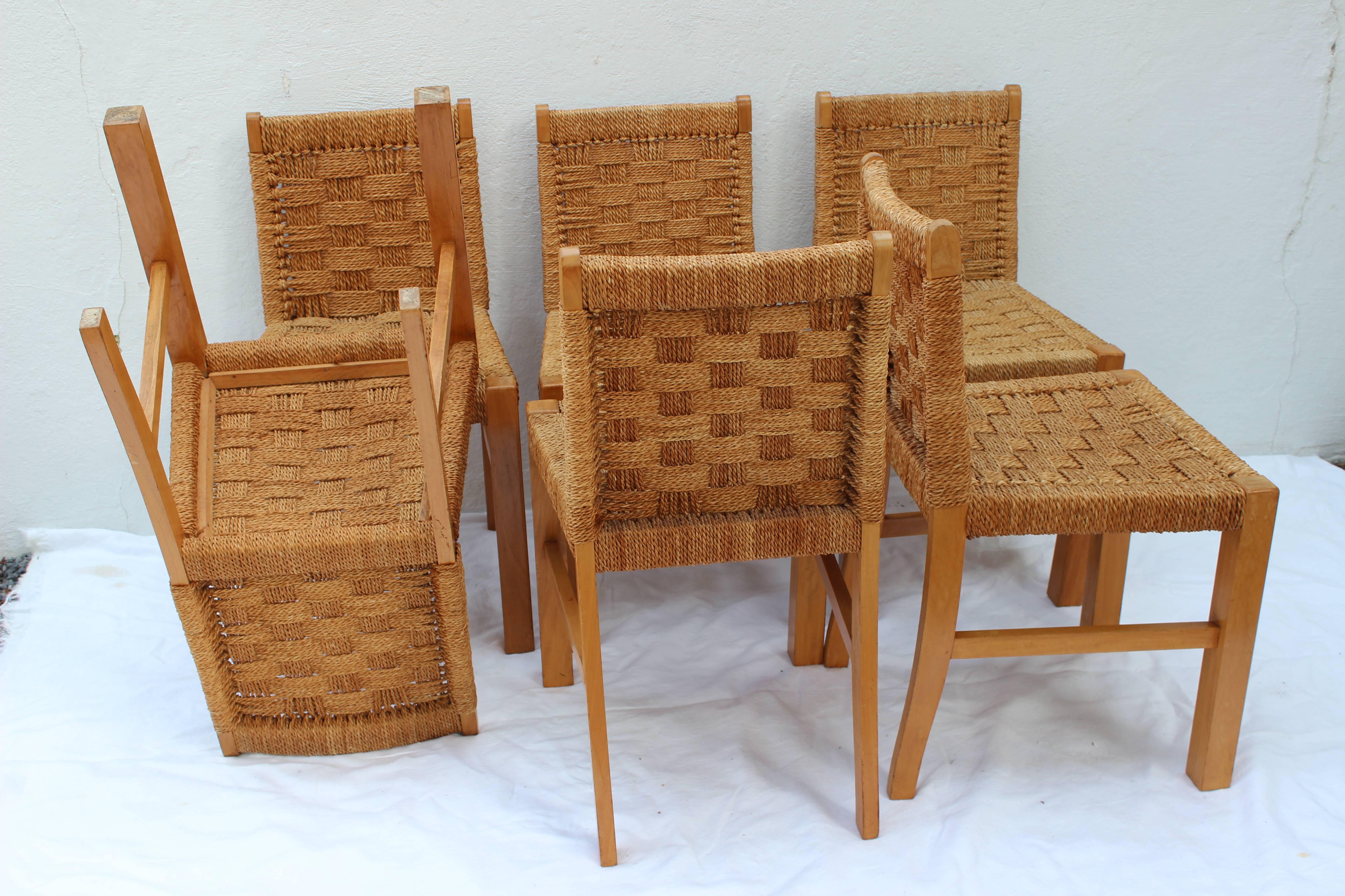 Set of six dining chairs in the style of Audoux Minet.