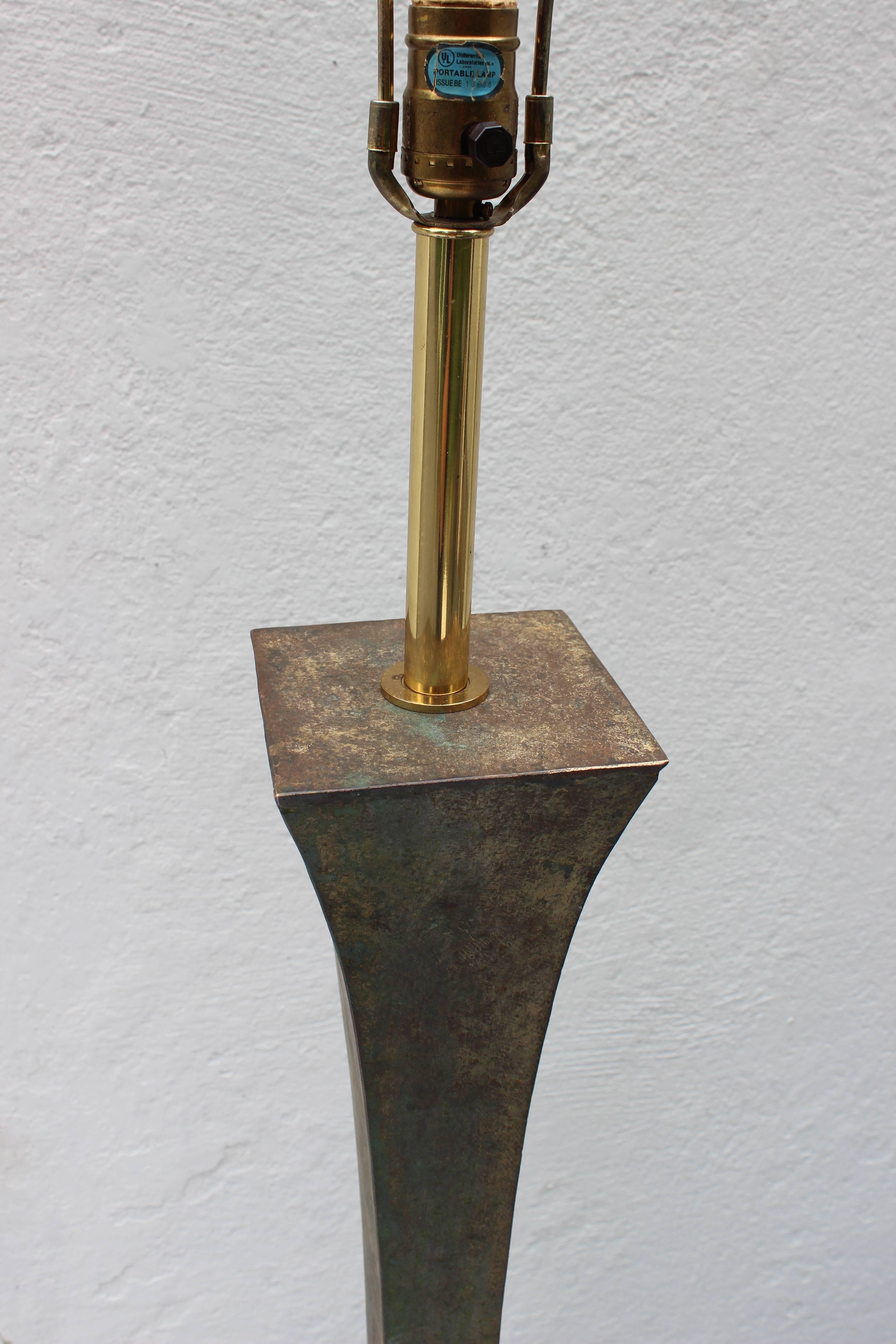 Verdigris floor lamp by Stewart Ross James for Hansen with ebonized wood base.

Measures: 66.5" overall H, 58" H to the socket.