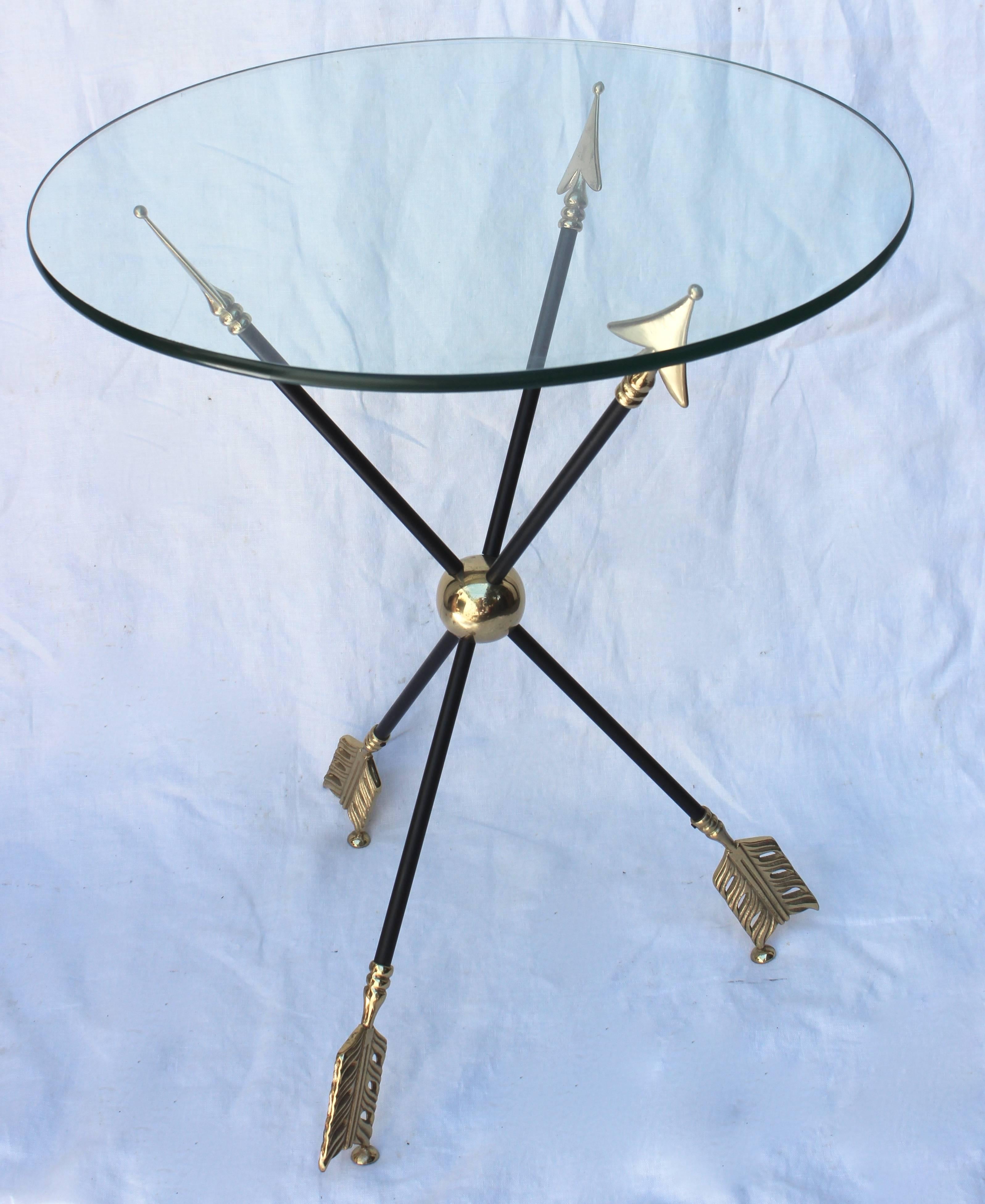 Handsome brass and iron side table with glass top in the Regency style...attributed to Maison Jansen.