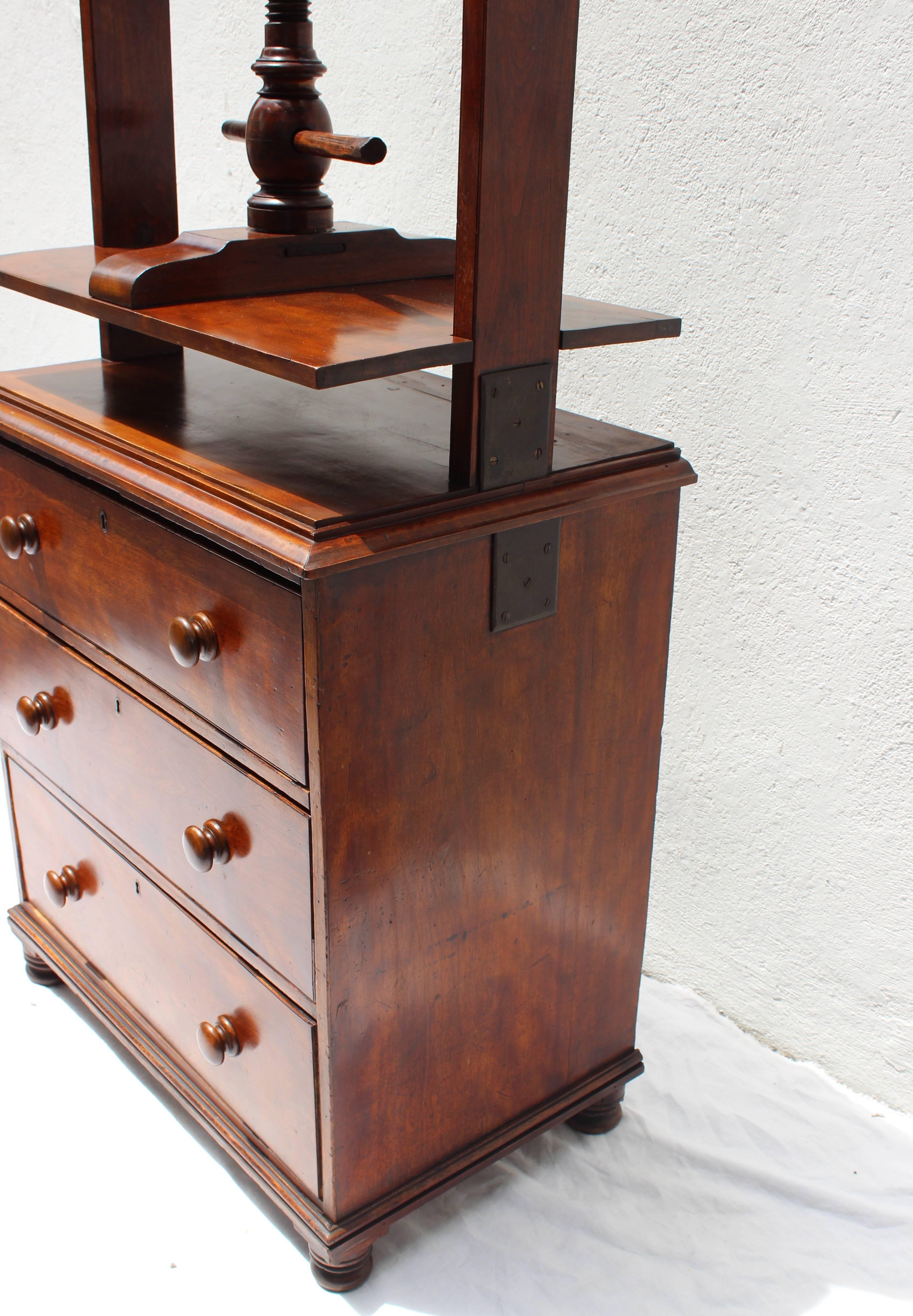 19th century mahogany chest of drawers with book press.