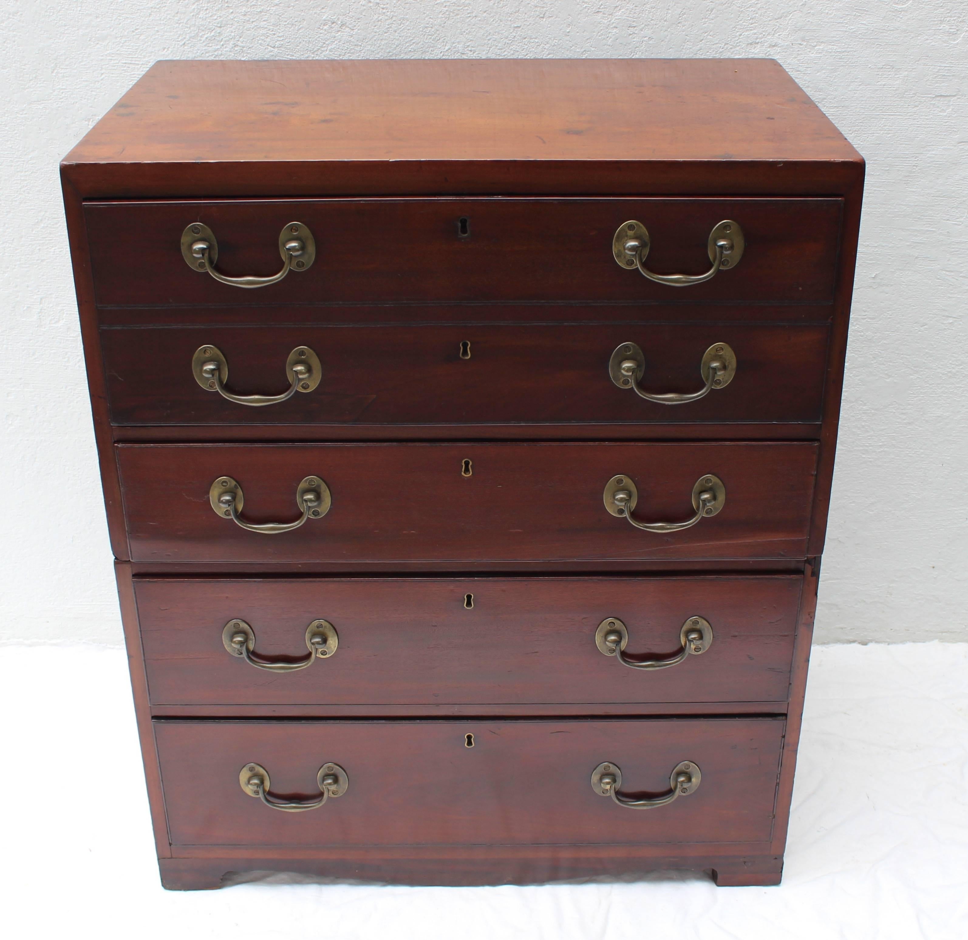 Fabulous 19th century English two-part campaign chest..... the top two drawers hold a pull-out desk...