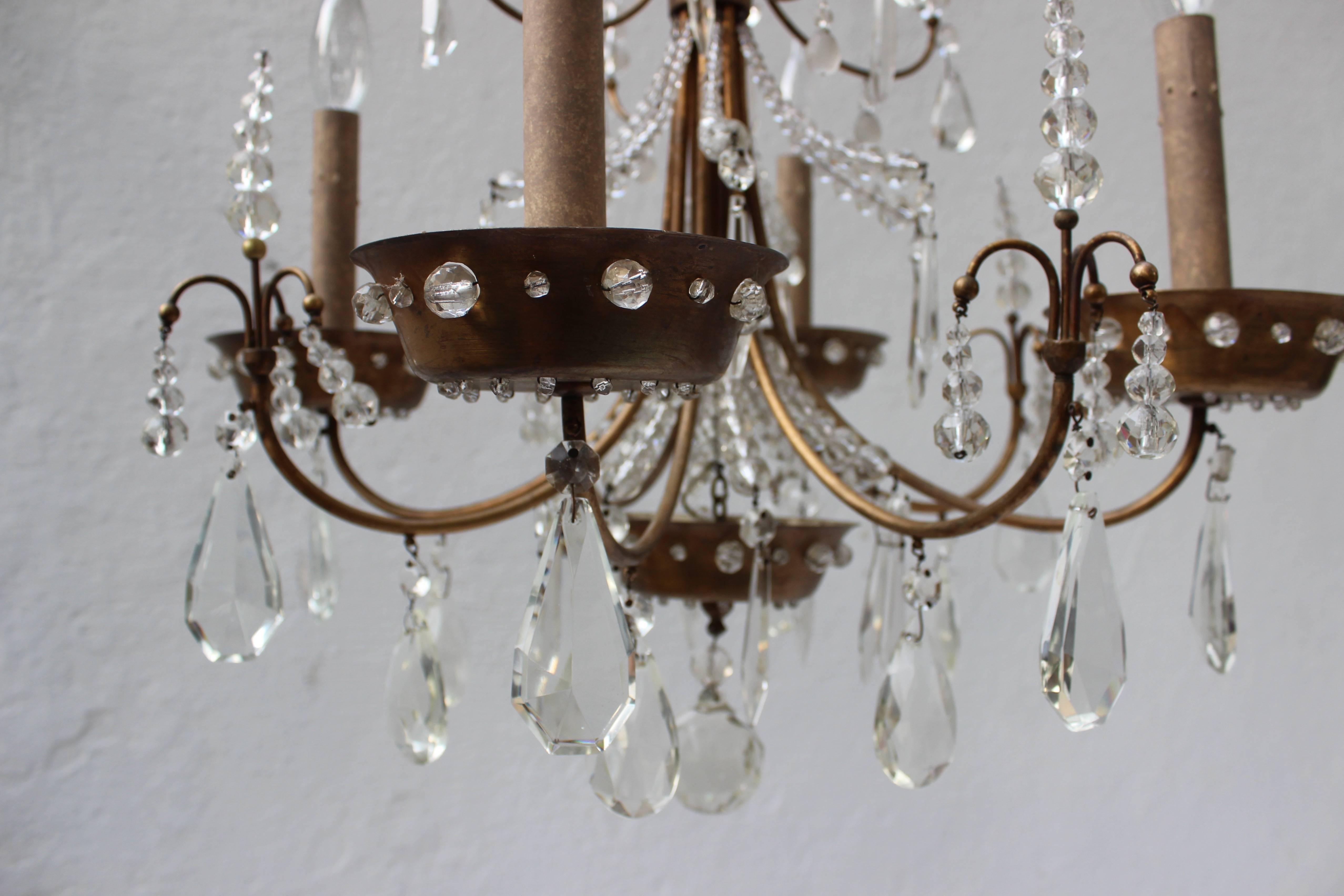 Maison Jansen Four-Arm Brass and Crystal Chandelier In Good Condition For Sale In East Hampton, NY