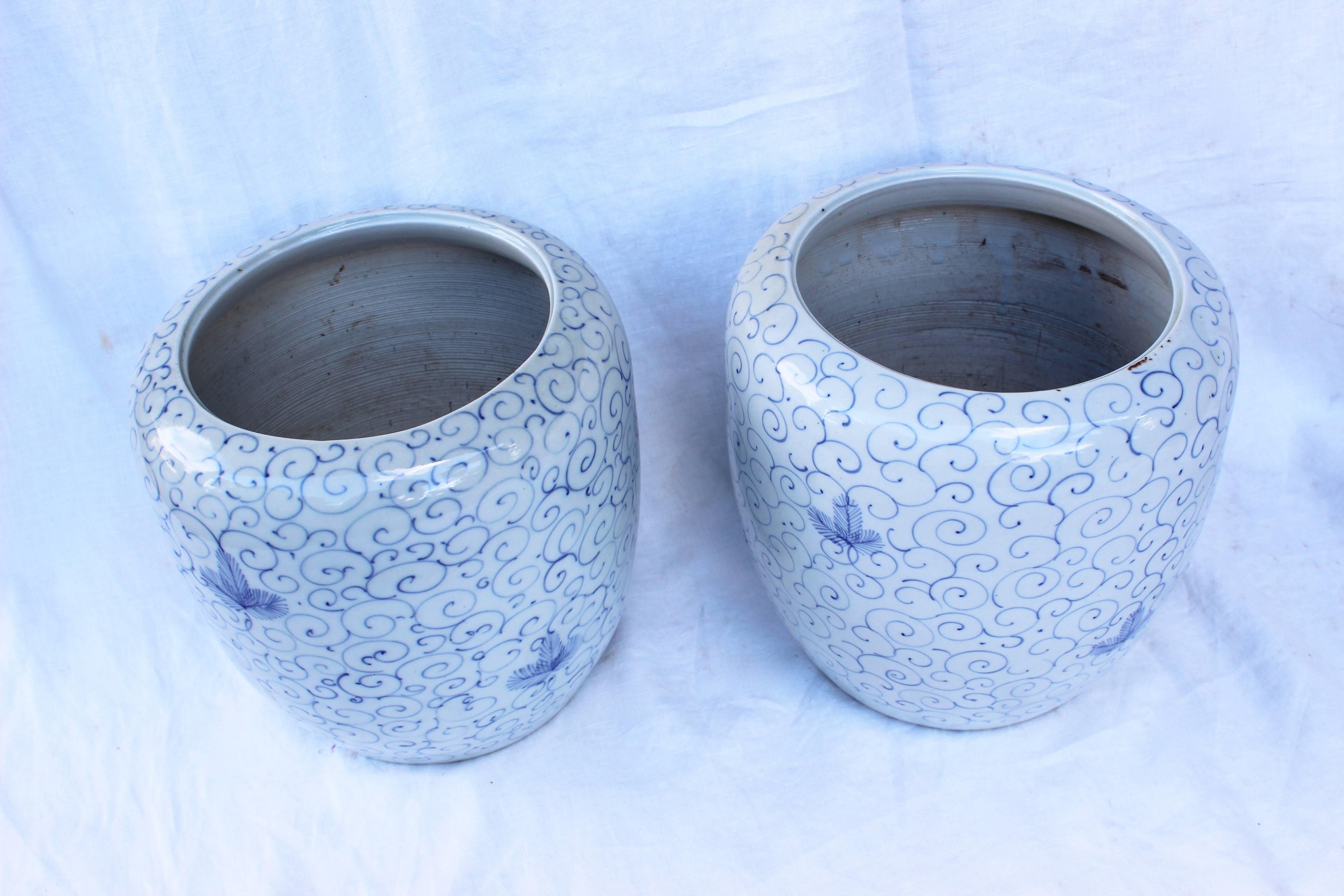 Wonderful pair of Chinese blue and white ceramic planters/ vases.